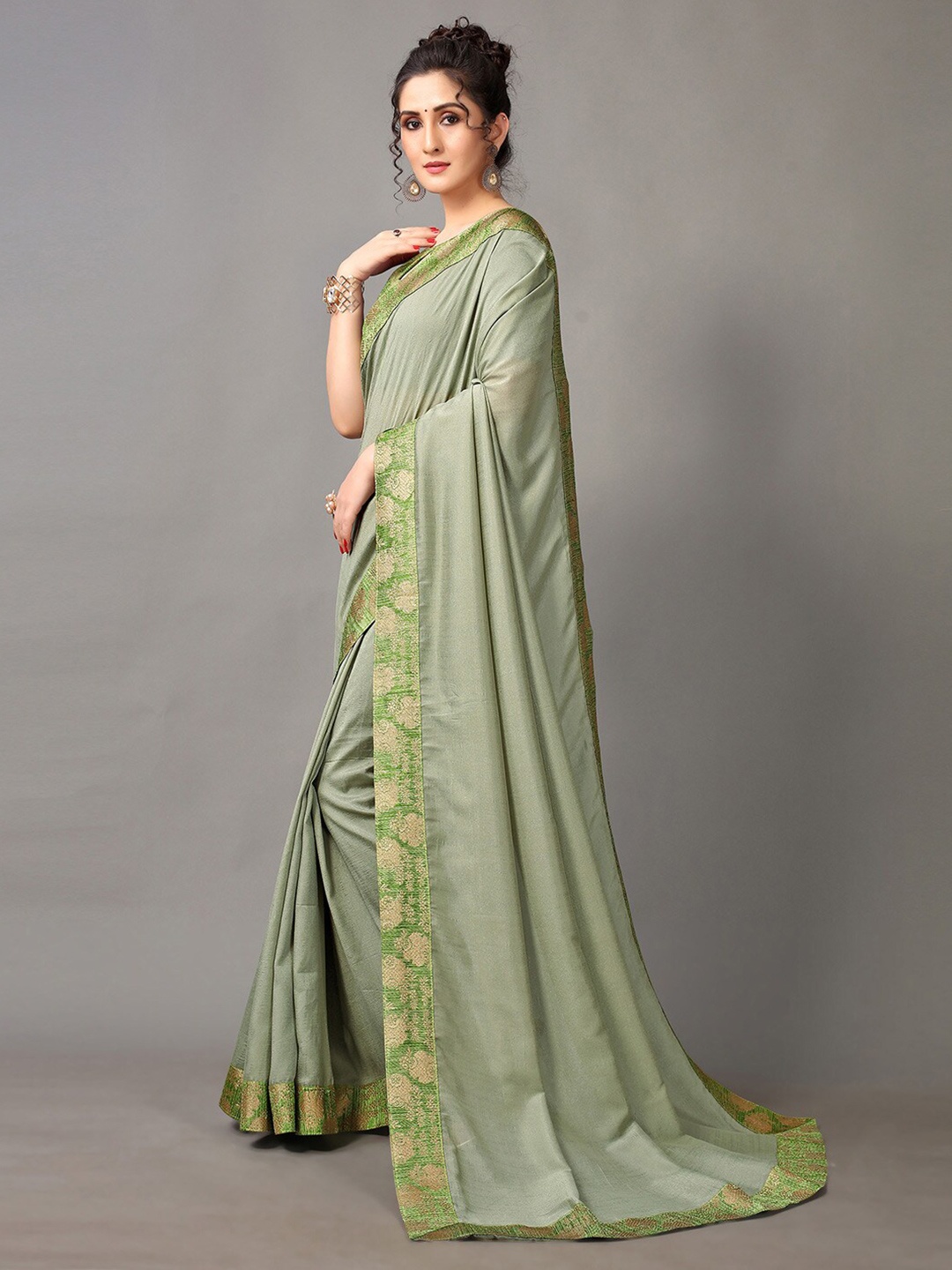 

Shaily Green Woven Design Saree
