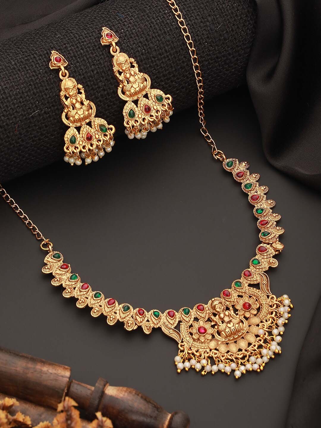 

Jazz and Sizzle Gold-Plated Stones Studded & Beads Beaded Temple Necklace With Earrings