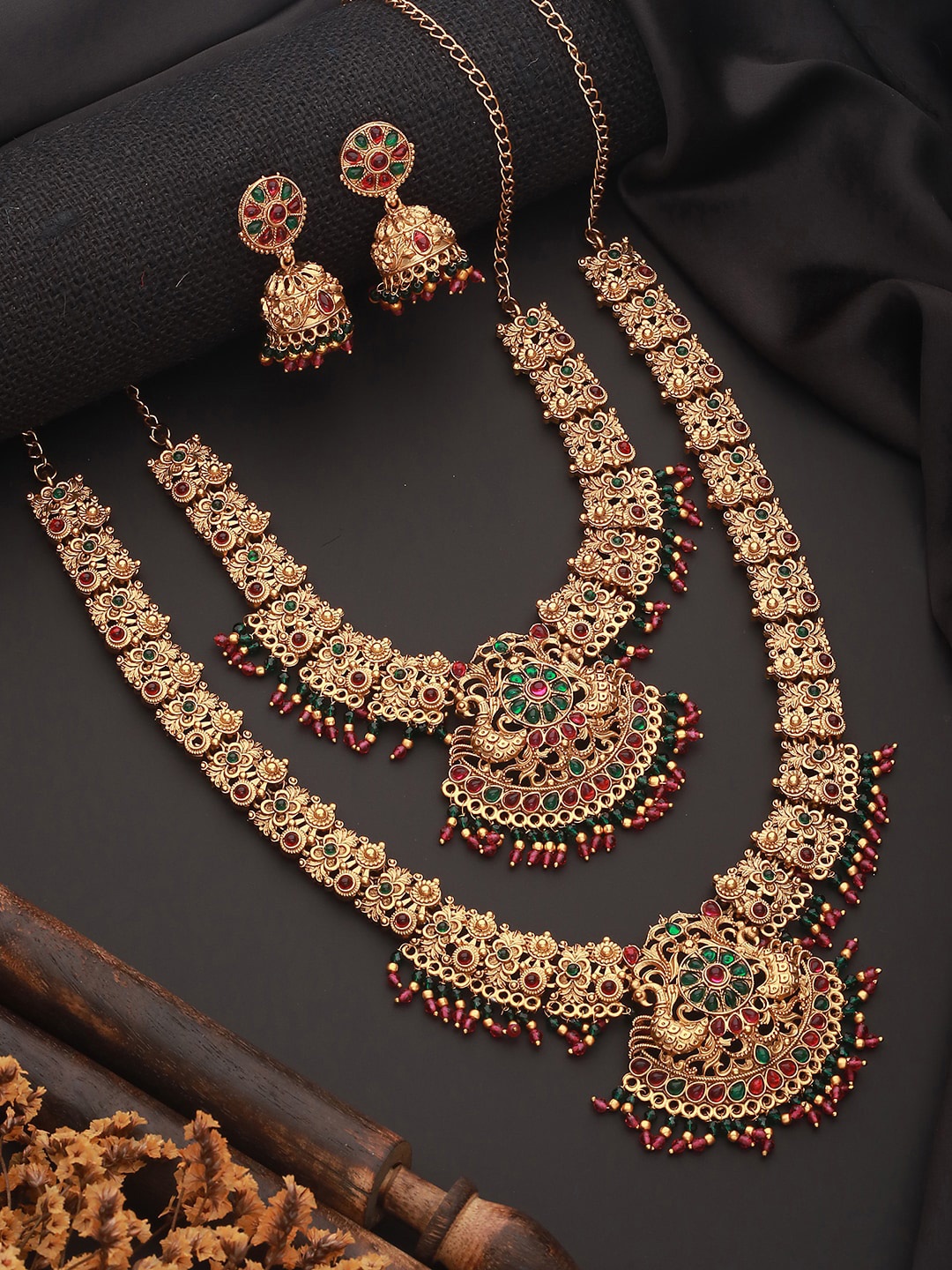 

Jazz and Sizzle Gold-Plated Stones Studded & Beads Beaded Temple Necklace With Earrings