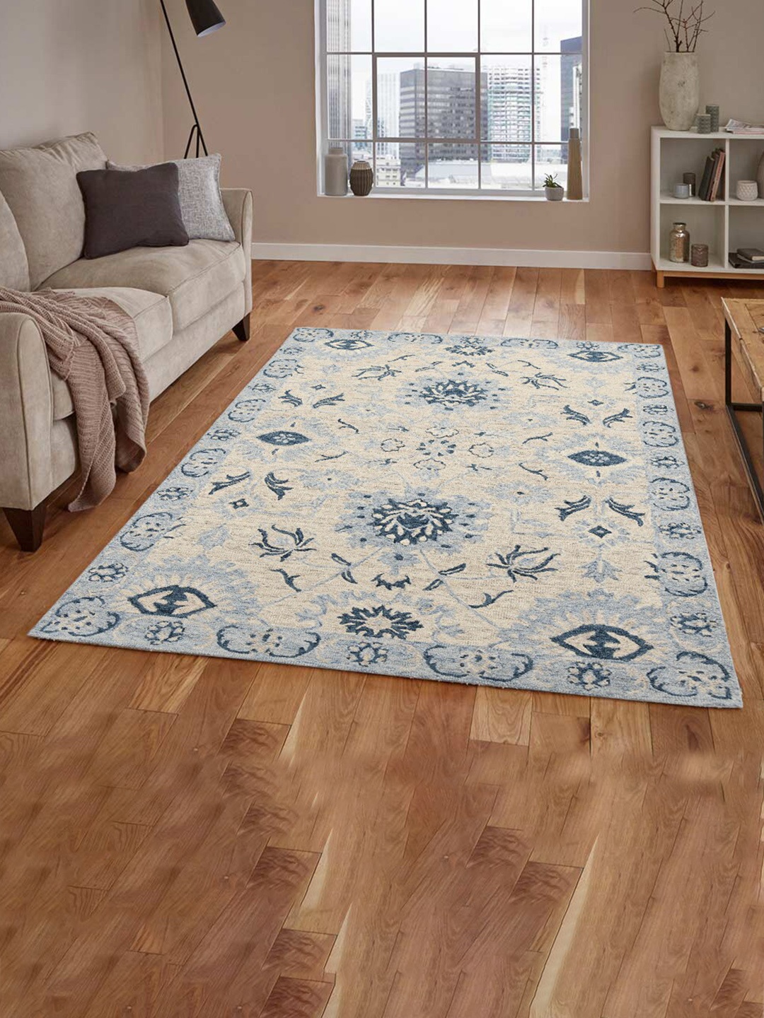 

saraswatii global Blue & Beige Floral Printed Woolen Rectangle Carpet