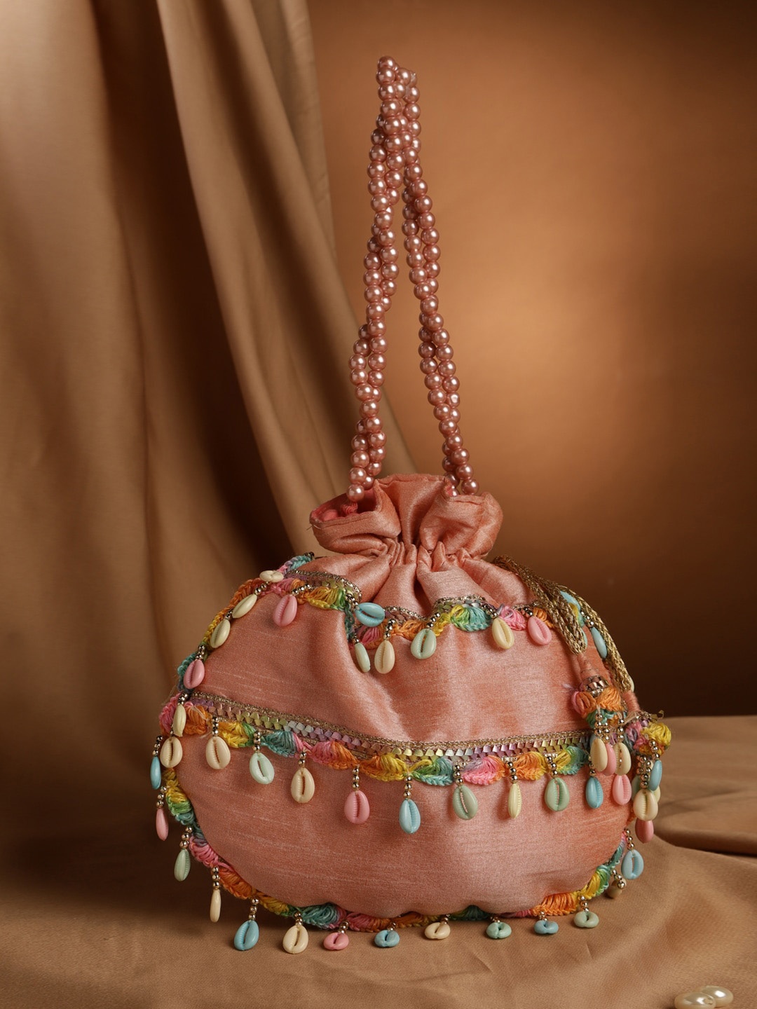 

DEEBACO Shells & Beads Embellished Potli, Peach