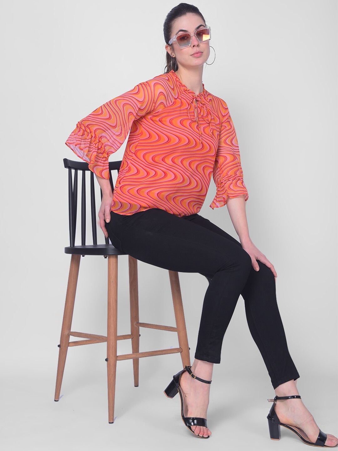 

Crimsoune Club Geometric Printed Tie-Up Neck Bell Sleeve Pure Cotton Top, Orange