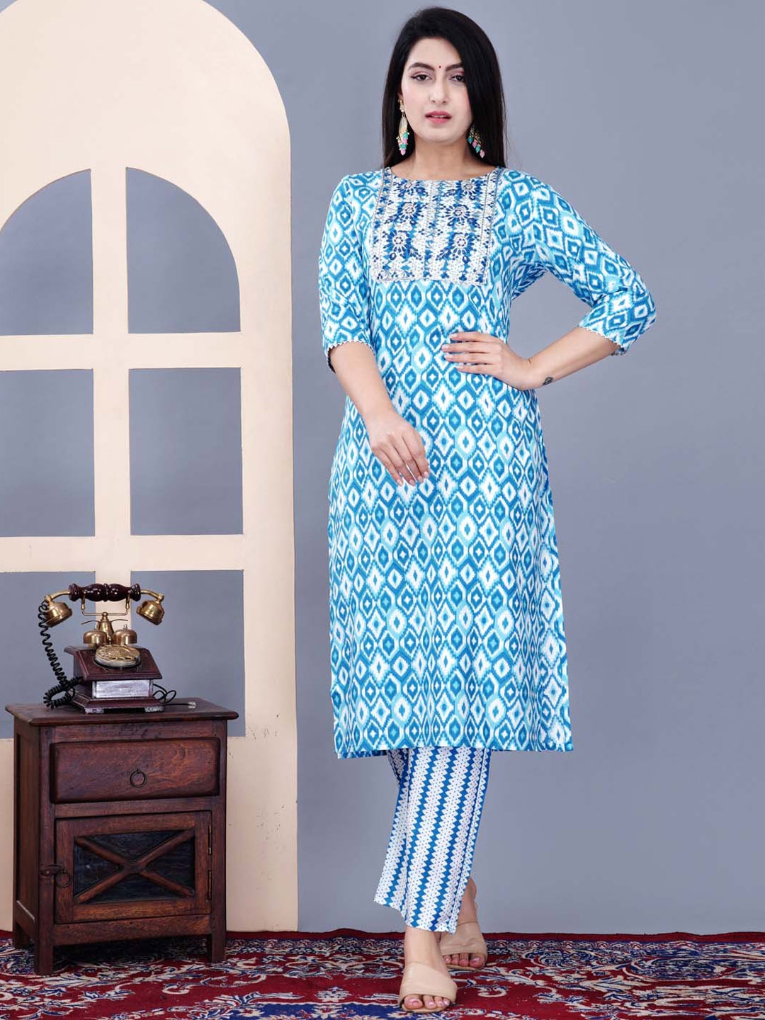 

Meena Bazaar Round Neck Three Quarter Sleeves Printed Regular Kurta with Trousers, Blue