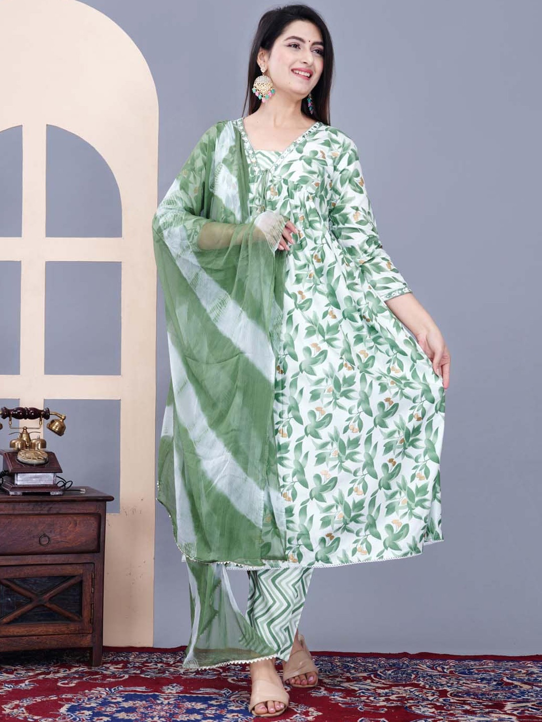 

Meena Bazaar Floral Printed Anarkali Tie-Up Neck Kurta with Trousers & With Dupatta, Green