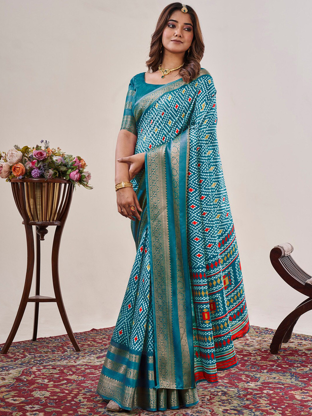 

Saree mall Blue Ethnic Motifs Printed Zari Sungudi Sarees