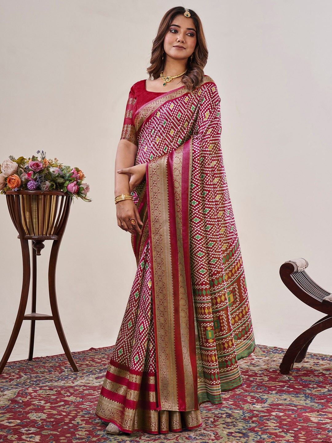 

Saree mall Red Ethnic Motifs Printed Zari Sungudi Sarees