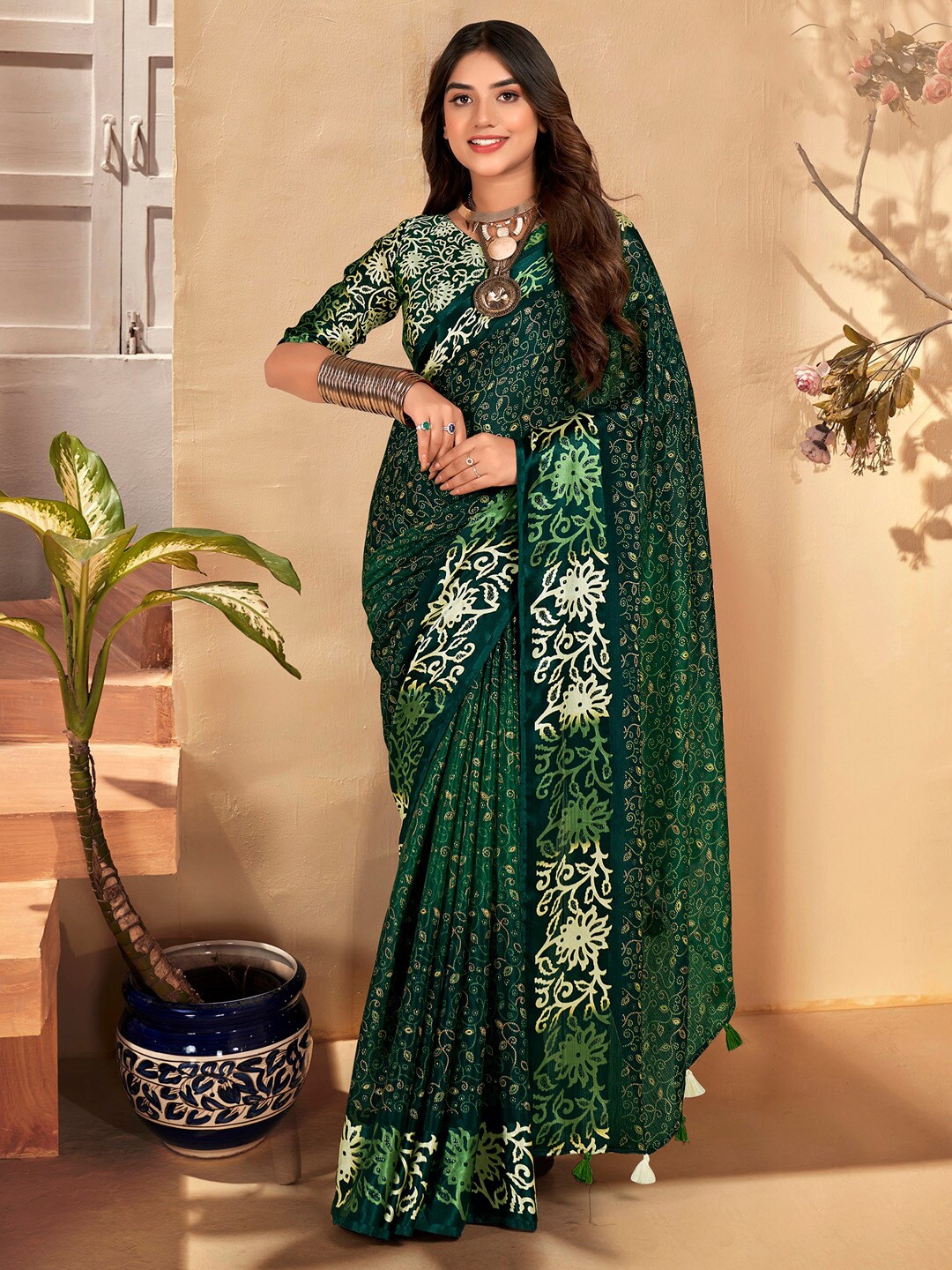 

Saree mall Green Floral Printed Bagh Saree With Tassels