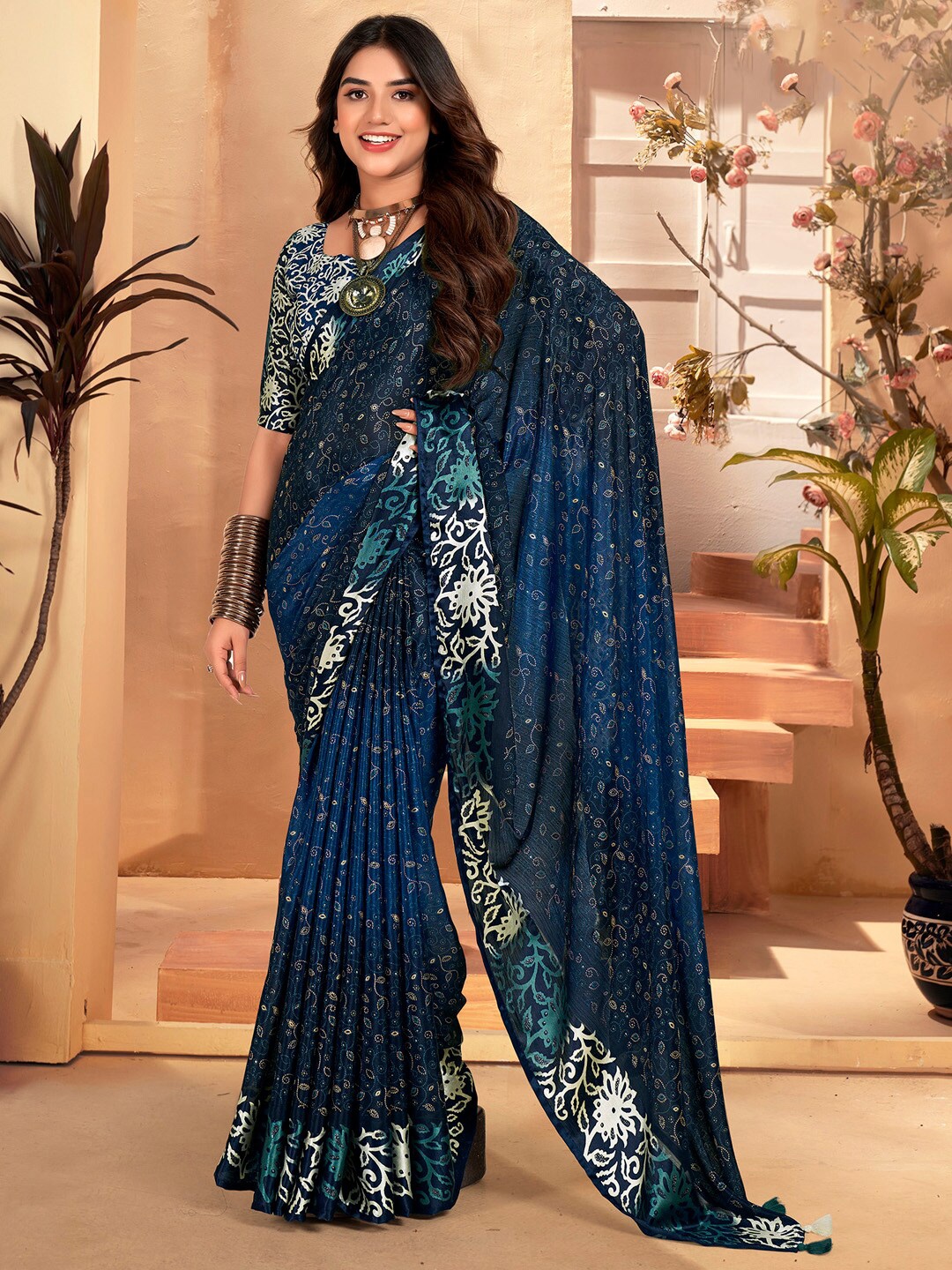 

Saree mall Teal blue Ethnic Motifs Embellished Beads & Stones Bagh Saree