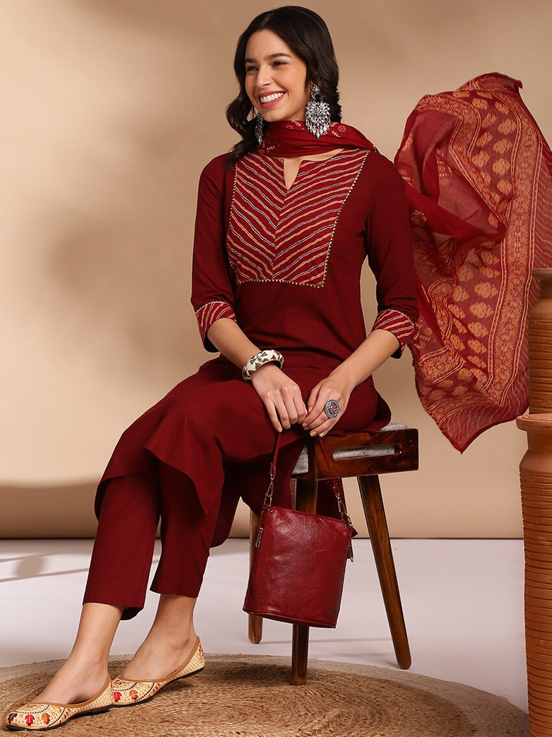 

Anouk Ethnic Motifs Yoke Design Round Neck Three-Quarter Sleeves Pure Cotton Kurta Set, Maroon