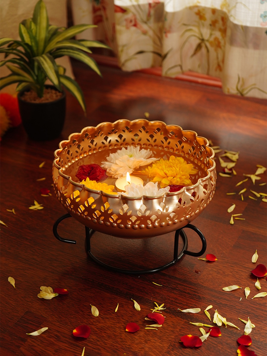 

Ekhasa Gold-Toned Floral Textured Decorative Metal Urli Bowl With Stand