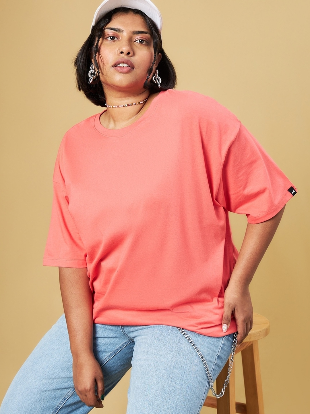 

Bewakoof Plus Round Neck Drop-Shoulder Sleeves Cotton Oversized T-shirt, Coral