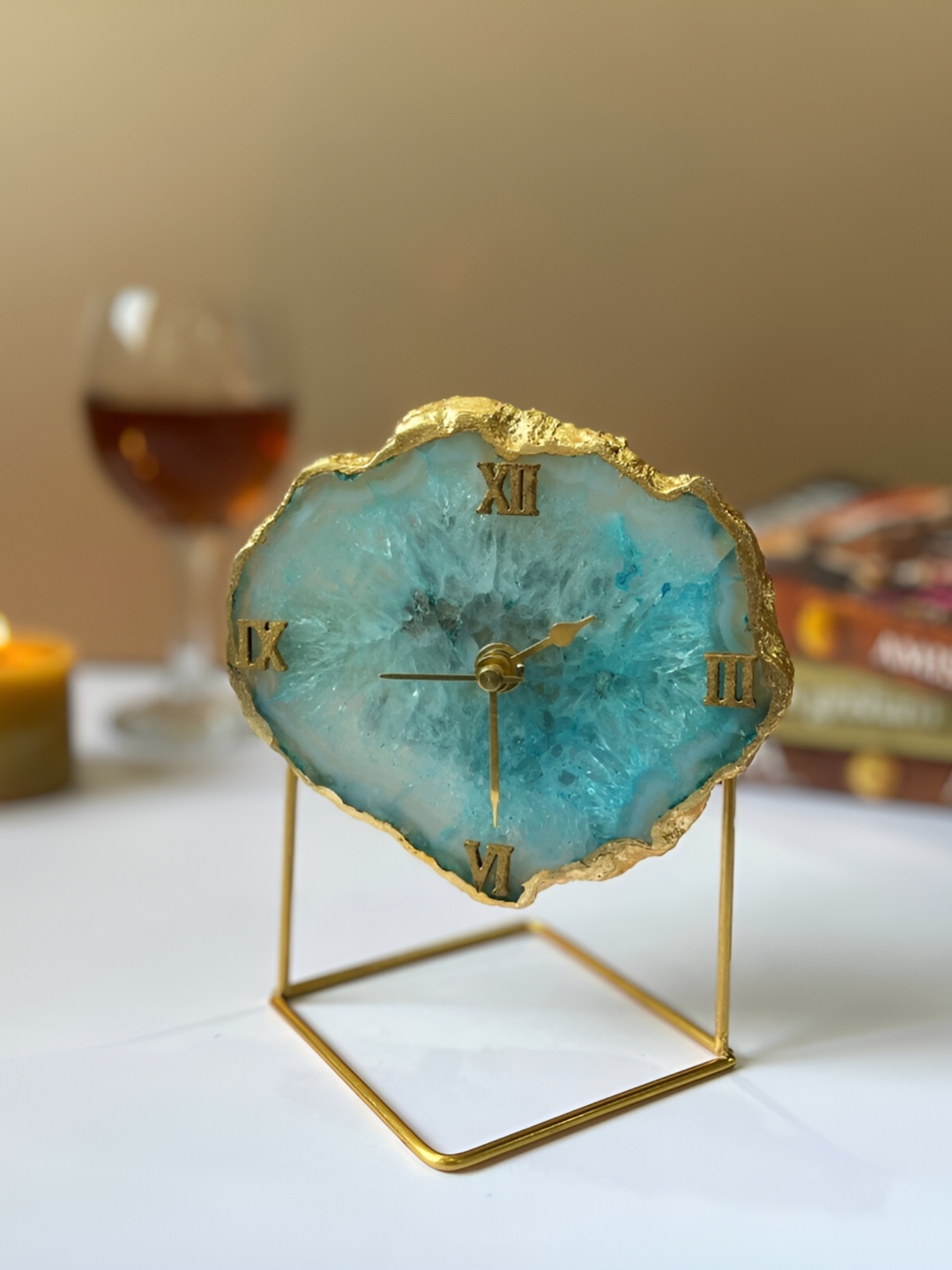 

HOMEARTE Turquoise Blue & Gold-Toned Printed Abstract Shaped Vintage Table Clock