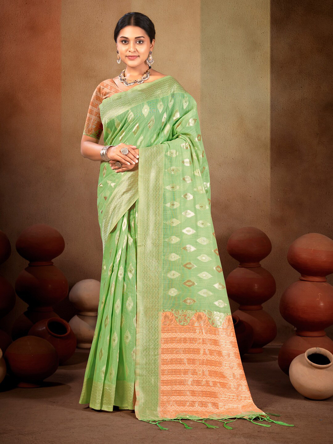 

Mitera Green & Pink Ethnic Motifs Woven Design Zari Saree