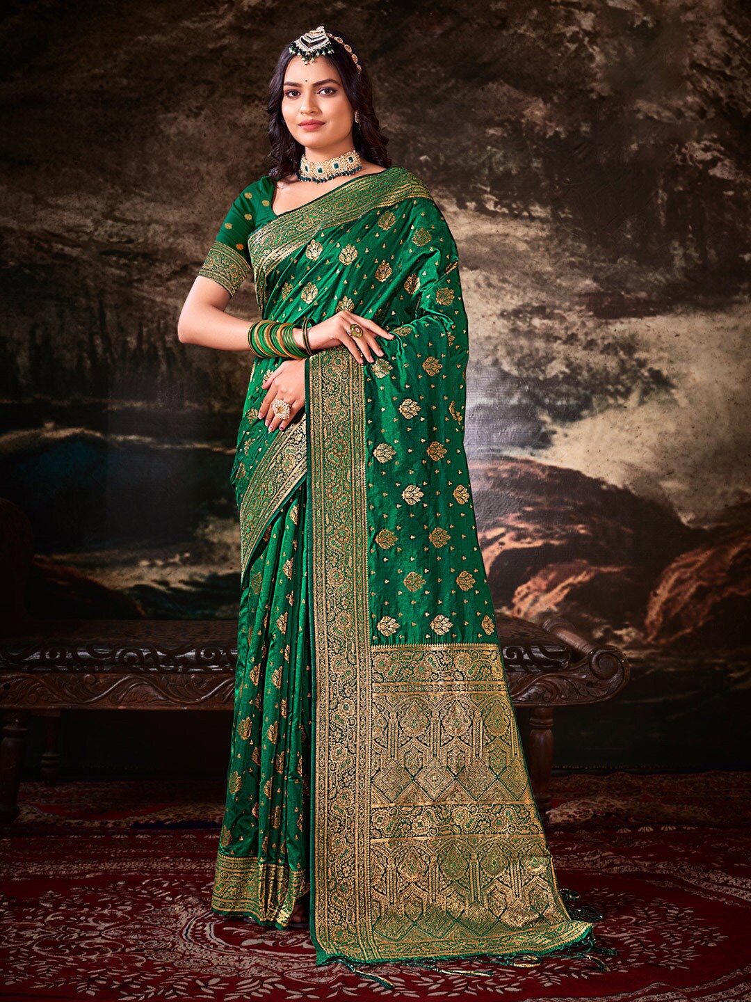 

Mitera Dark Green Ethnic Motifs Woven Design Zari Saree