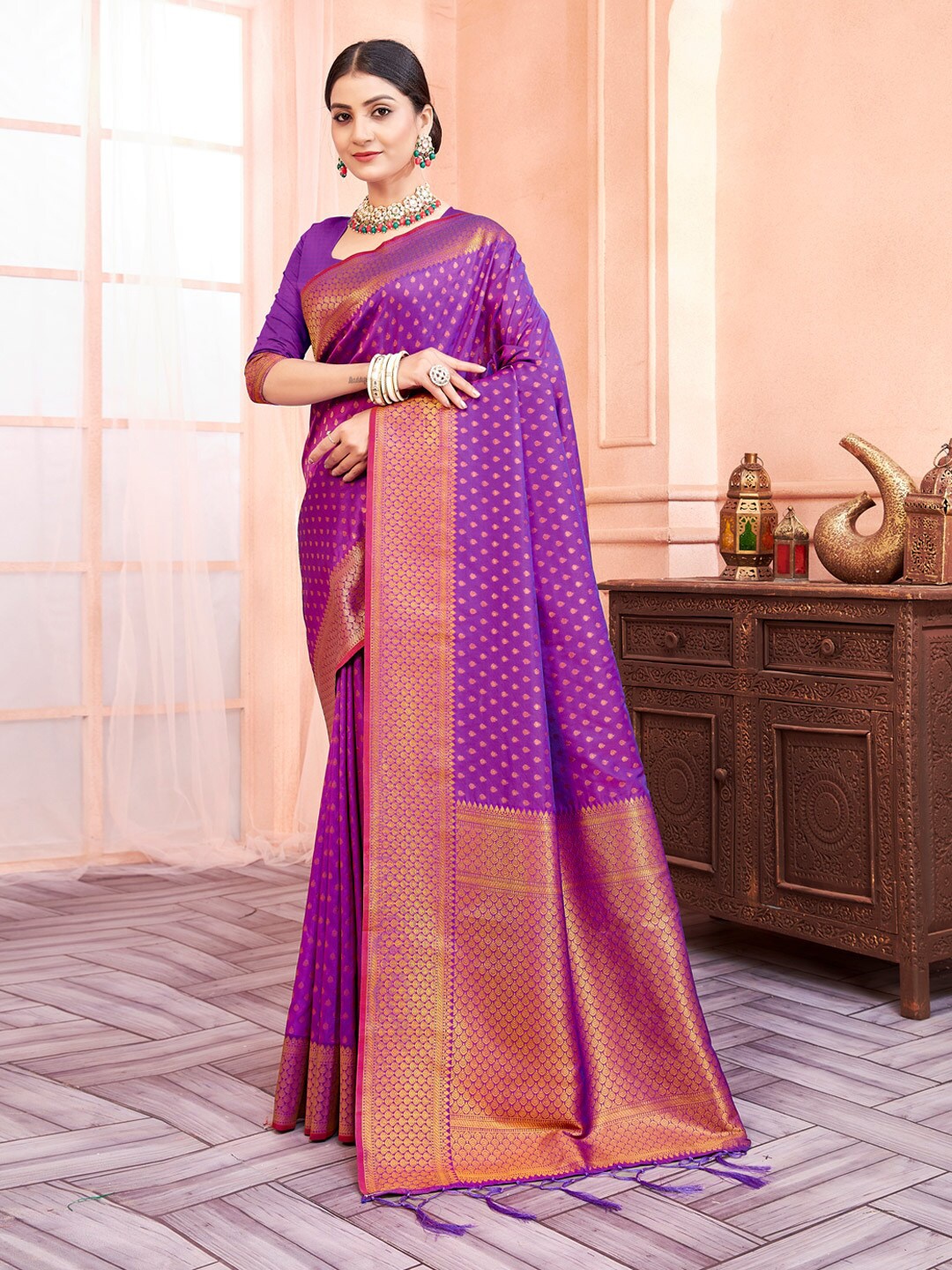 

Mitera Purple Ethnic Motifs Woven Design Zari Saree