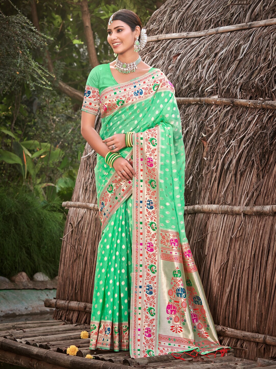 

Mitera Green & Pink Ethnic Motifs Woven Design Zari Paithani Saree