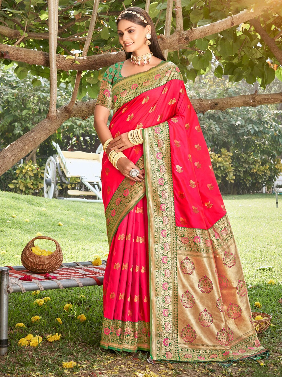 

Mitera Pink & Green Ethnic Motifs Woven Design Zari Saree