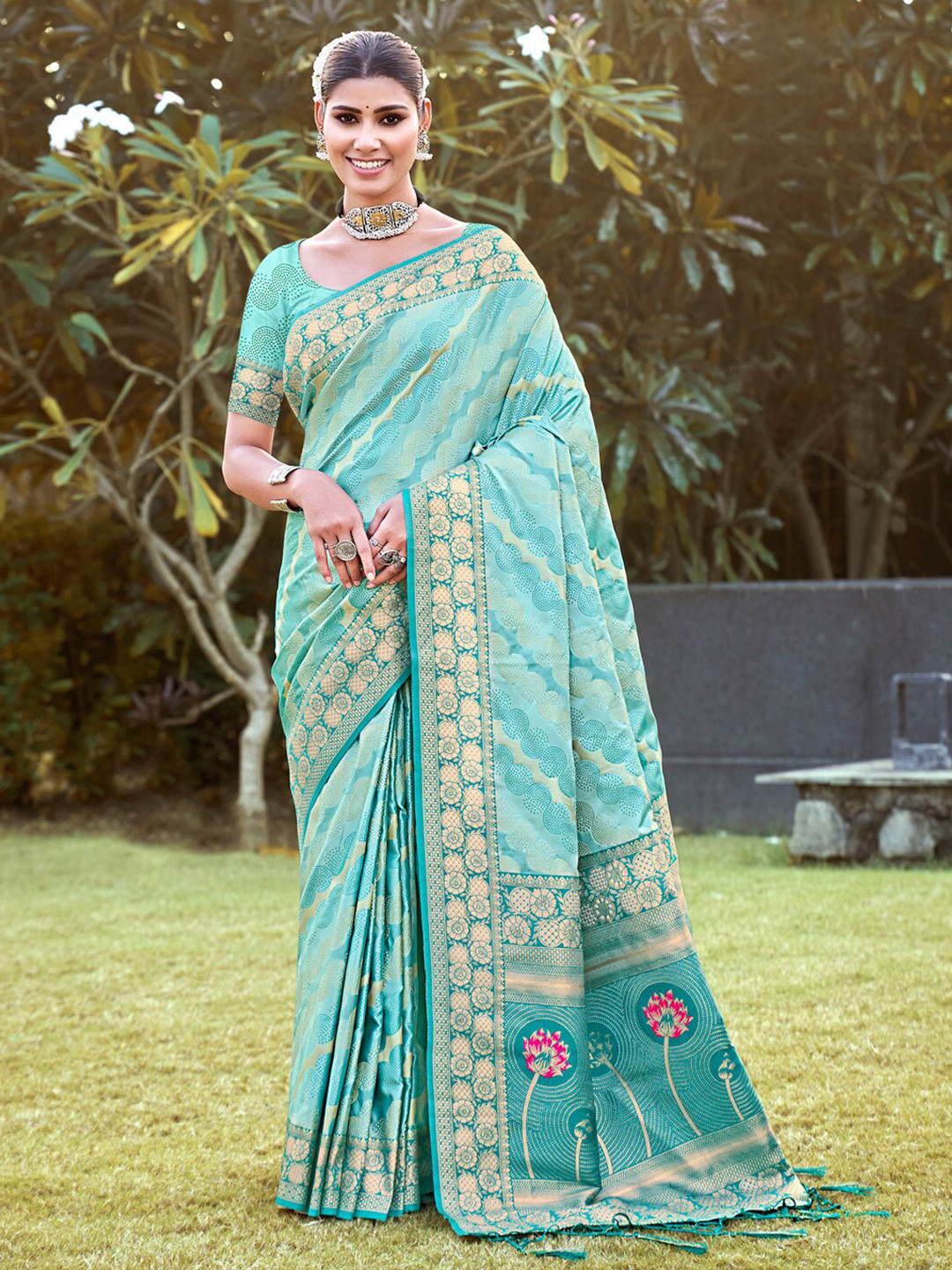 

Mitera Blue Ethnic Motifs Woven Design Zari Saree