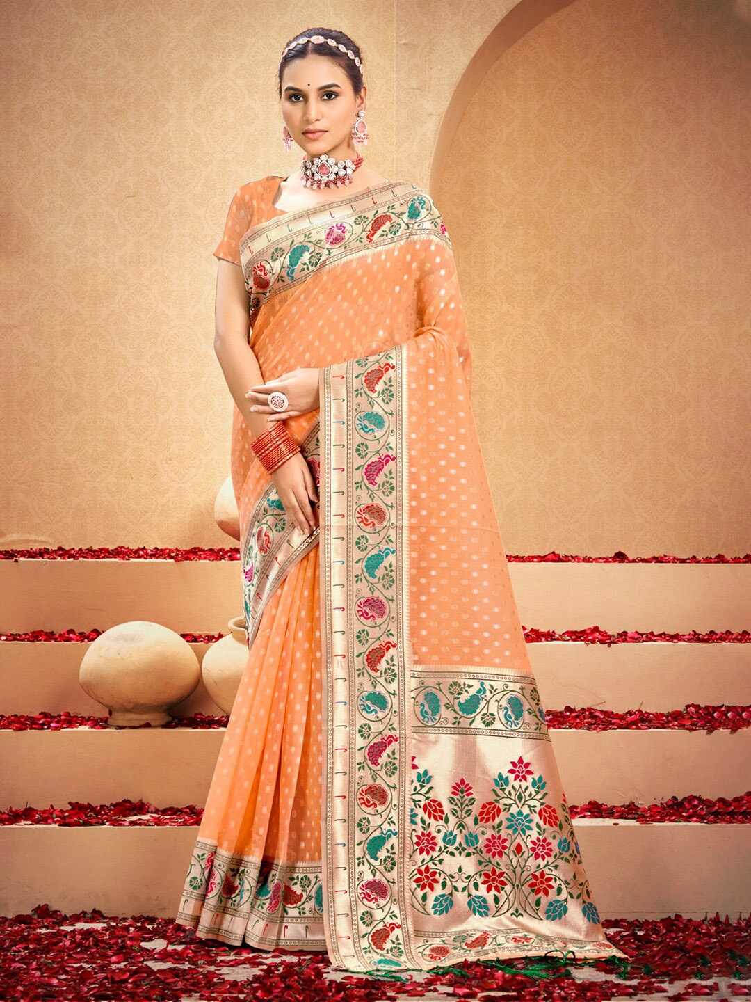 

Mitera Peach Colour Woven Design Zari Saree