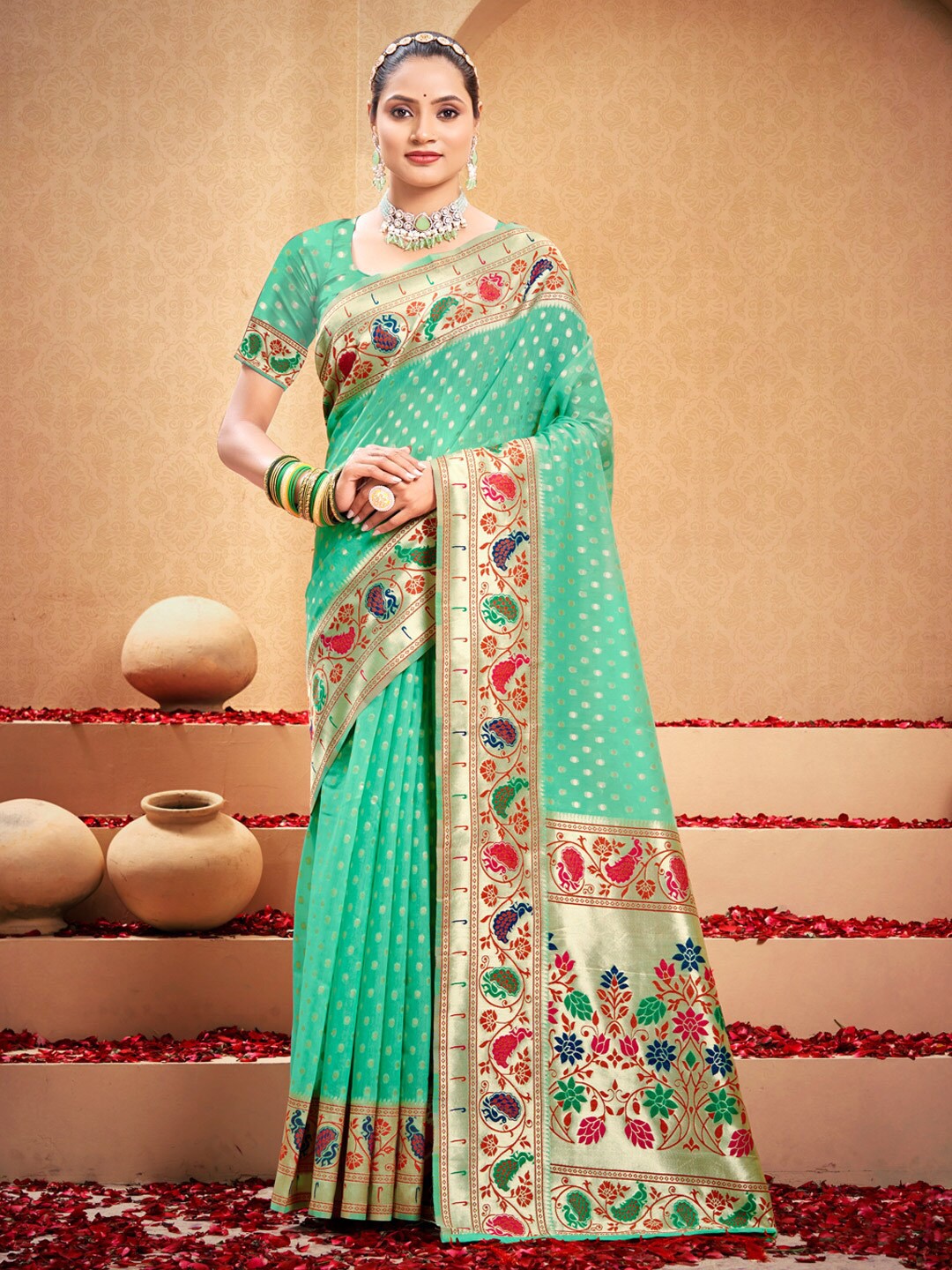 

Mitera Sea Green & Gold-Toned Ethnic Motifs Woven Design Zari Saree