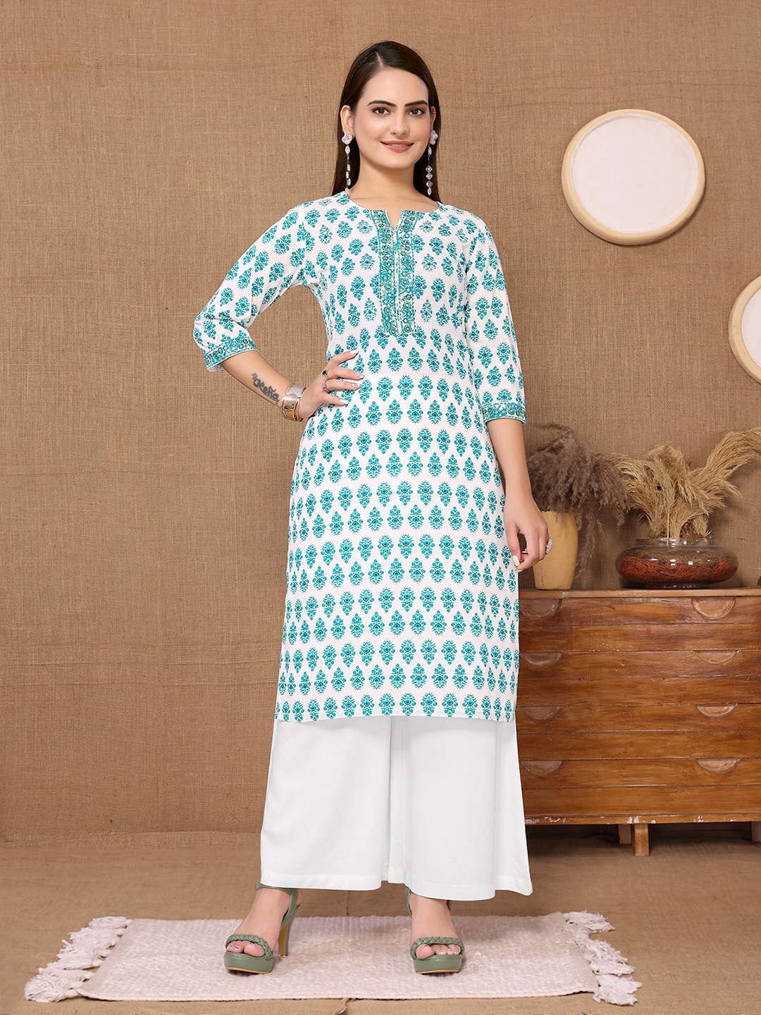 

Rangita Ethnic Motifs Printed Thread Work Straight Pure Cotton Kurta, Turquoise blue