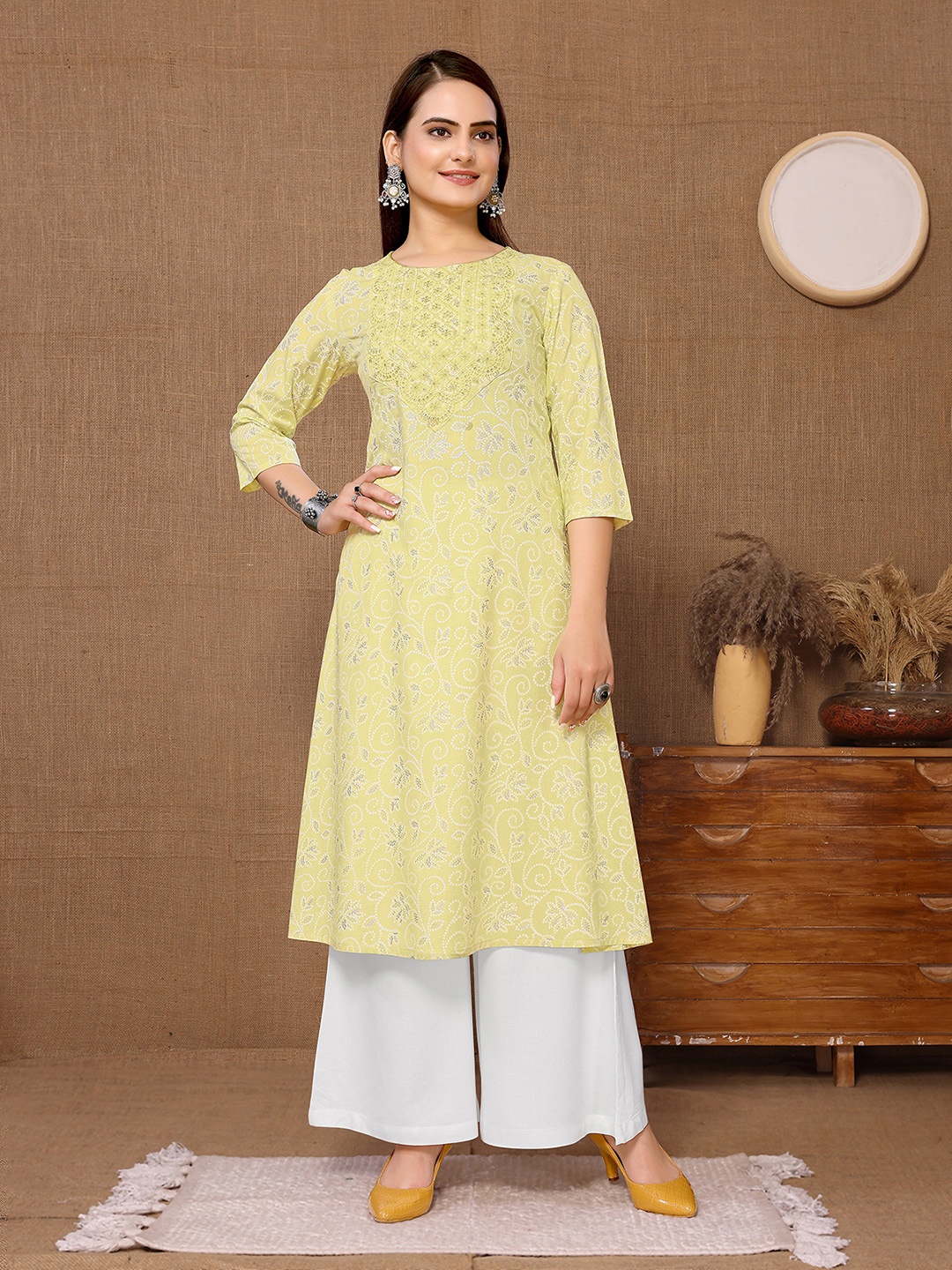 

Rangita Ethnic Motifs Embroidered Sequinned A Line Kurta, Yellow