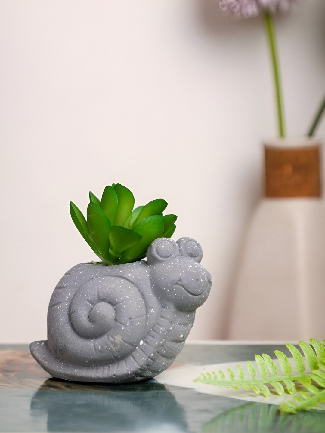 

Satyam Kraft Grey Succulent Artificial Flower With Pot