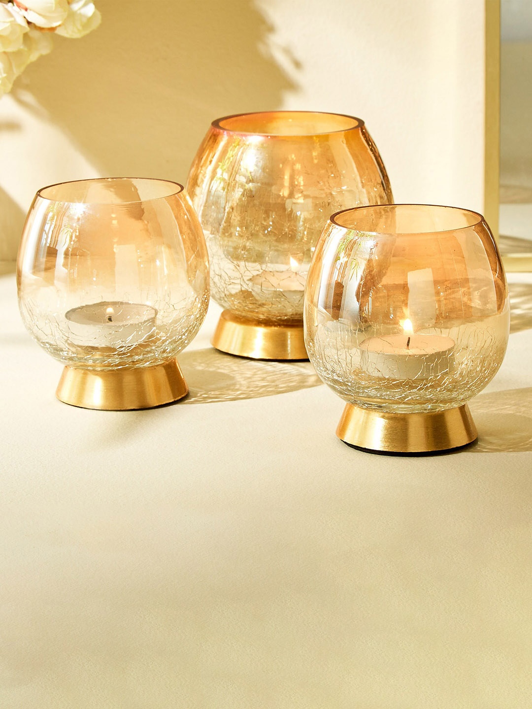 

Home Centre Gold-Toned 3 Pieces T- Light Candle Holders