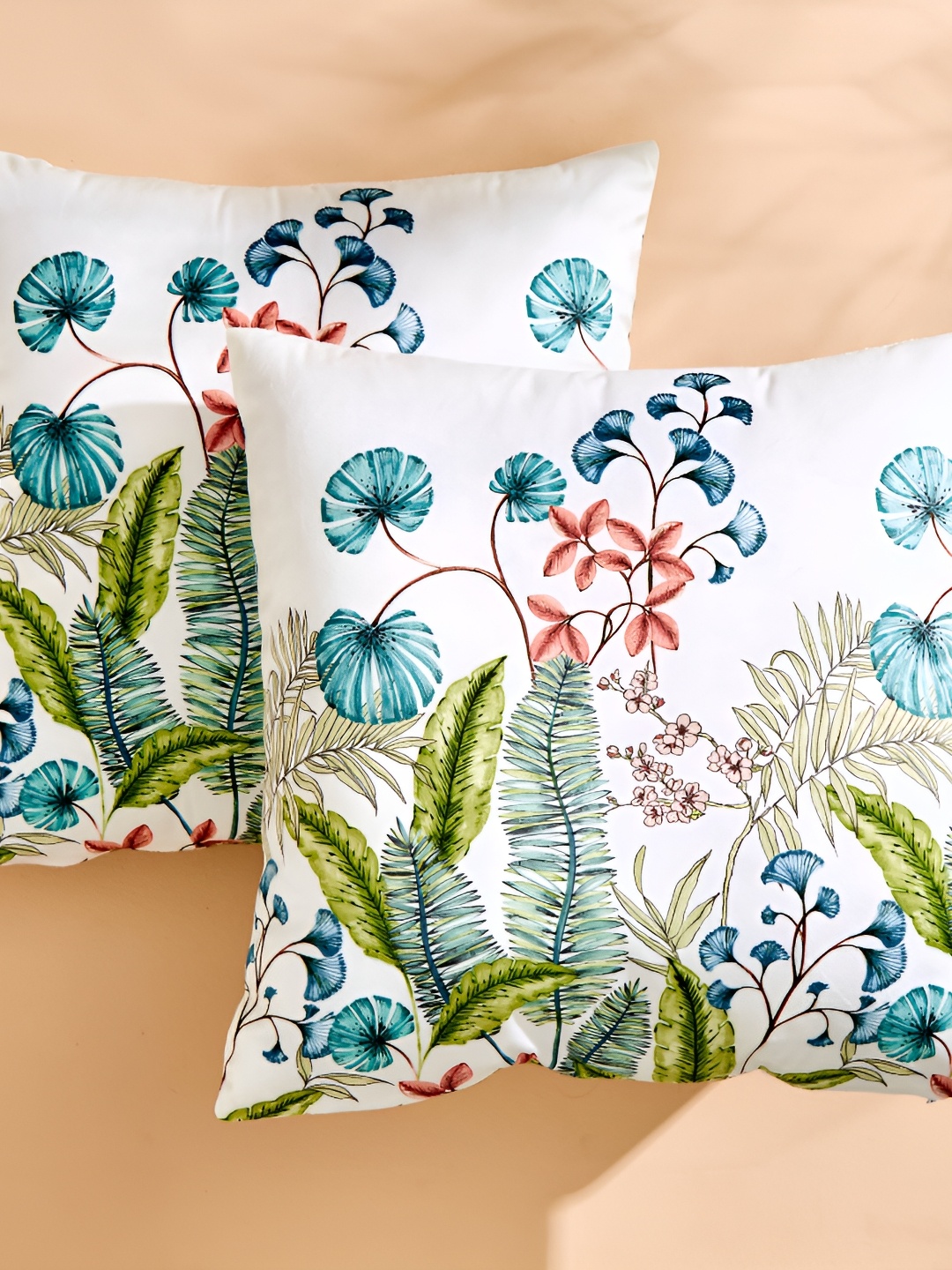 

Home Centre White & Blue 2 Pieces Floral Embellished Square Cushion Covers