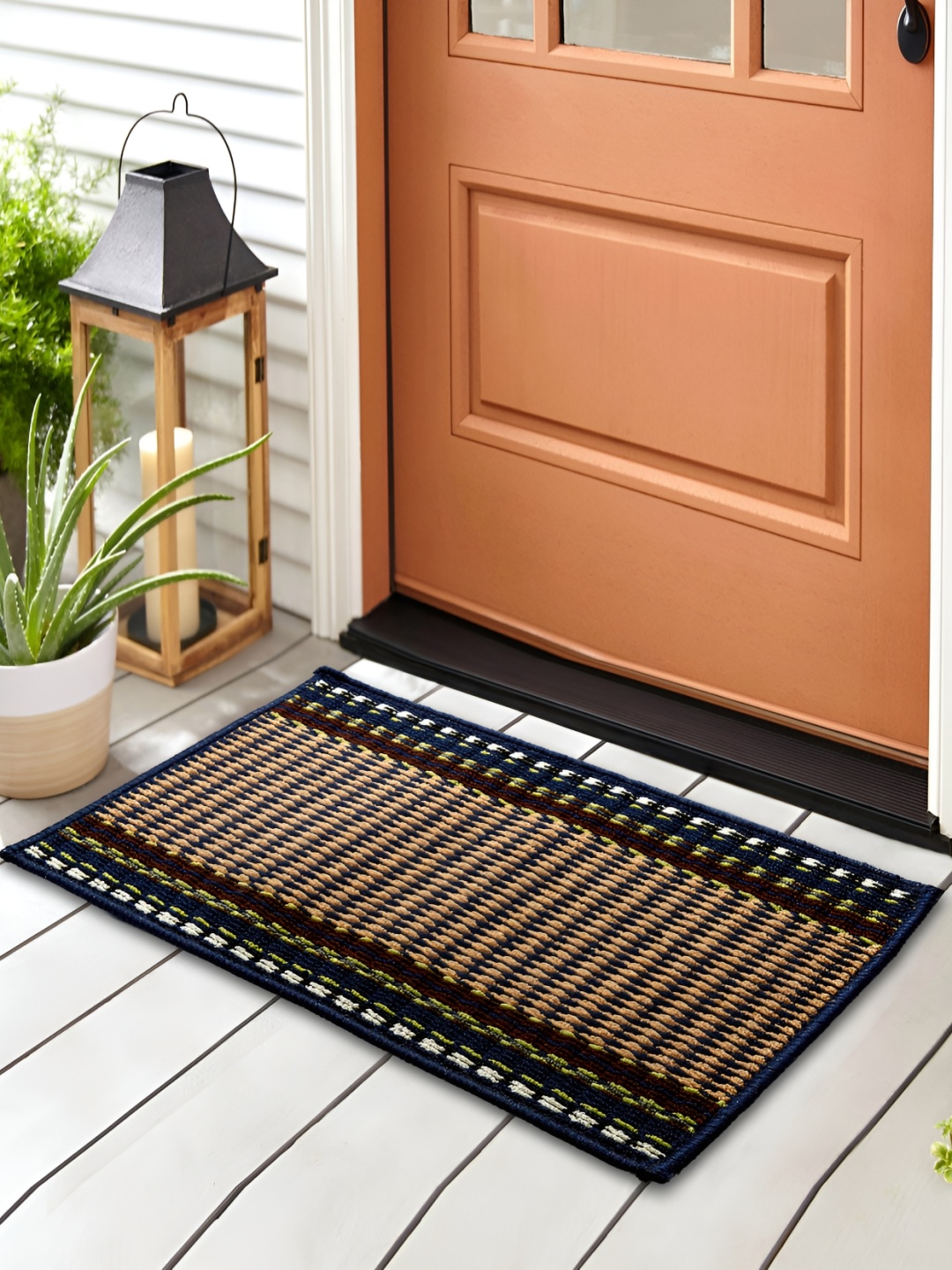 

Home Centre Freda Zebra Black & Brown Woven Design Anti-Skid Tufted Door Mat
