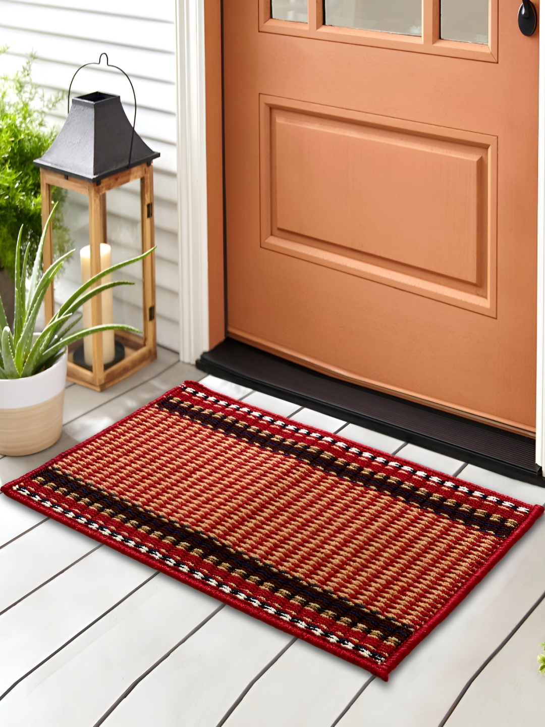 

Home Centre Freda Zebra Brown & Red Tufted Anti-skid Doormat