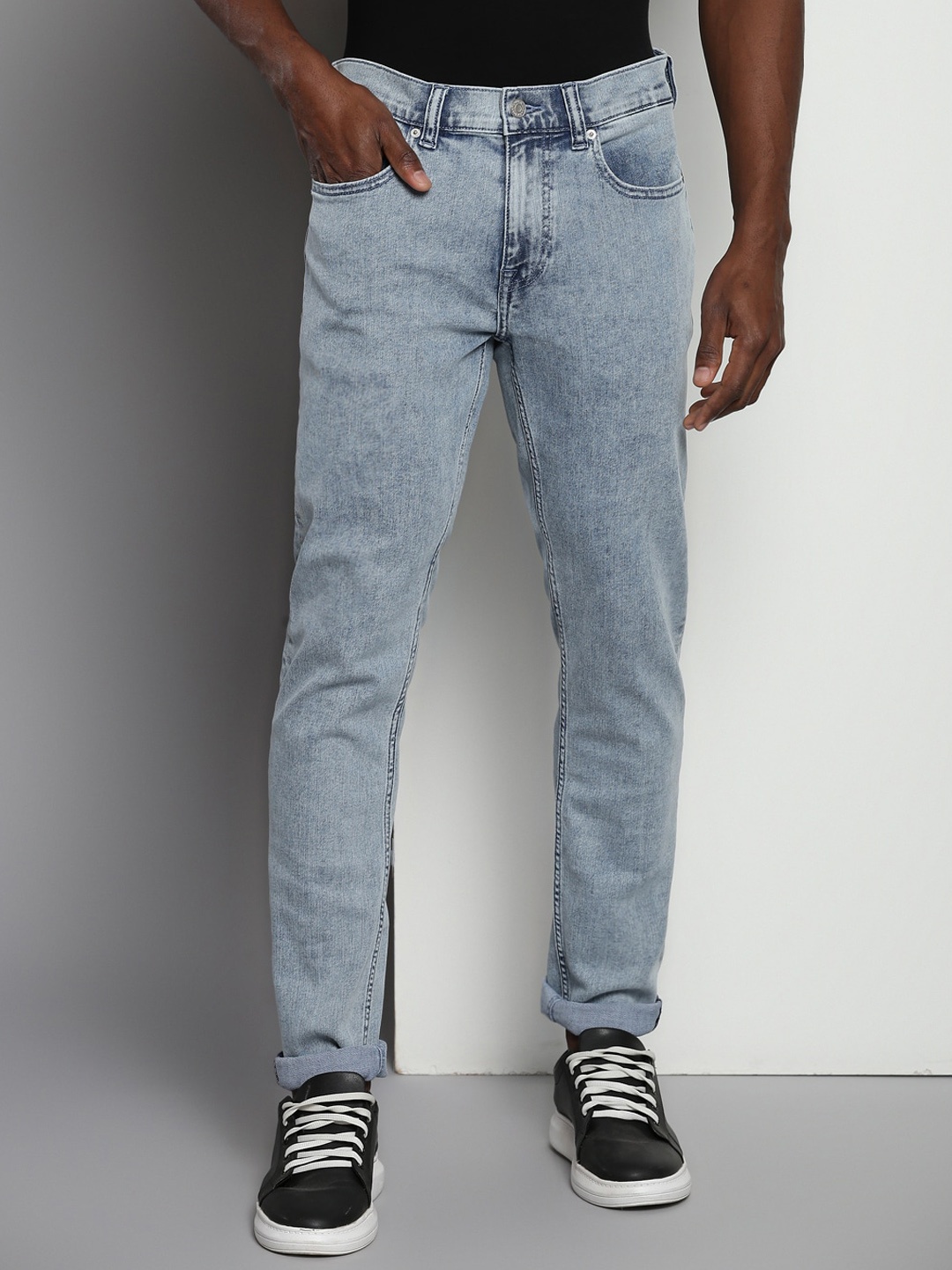 

Tommy Hilfiger Men Slim Fit Heavy Fade Clean Look Jeans, Blue