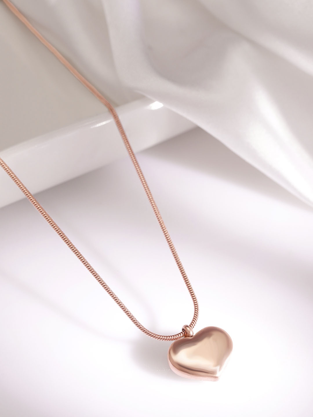 

Rubans Voguish 18k Rose gold plated tarnish with heart statment pendant necklace