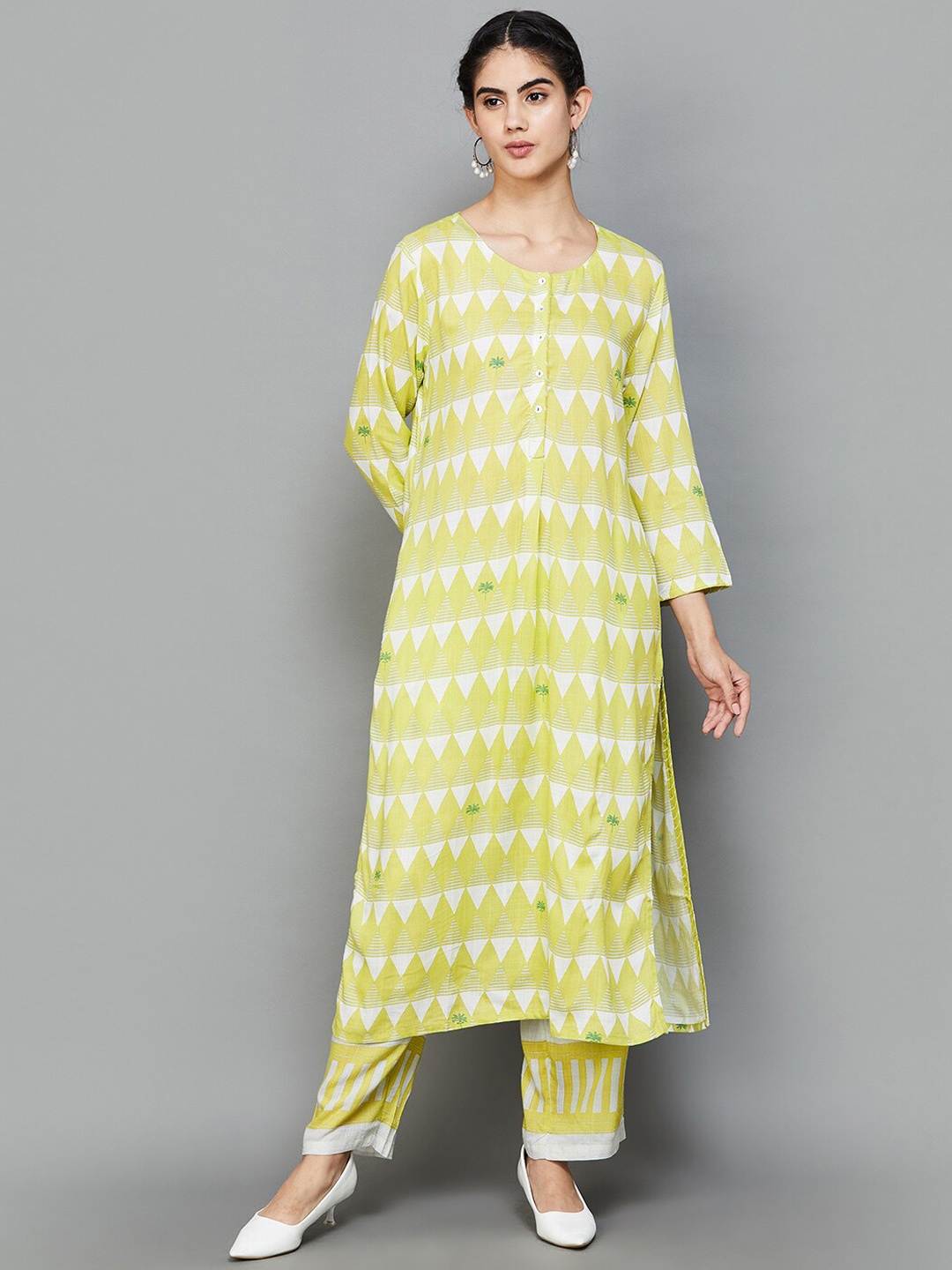 

Melange by Lifestyle Printed Regular Kurta with Palazzos, Yellow