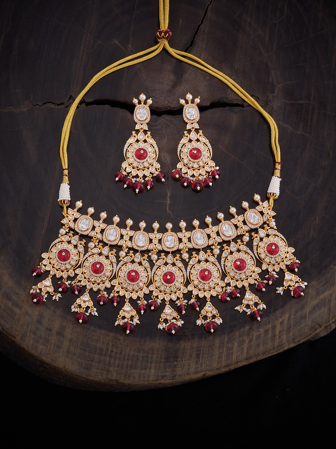

Kushal's Fashion Jewellery Gold Plated Kundan Studded & Beaded Necklace & Earrings