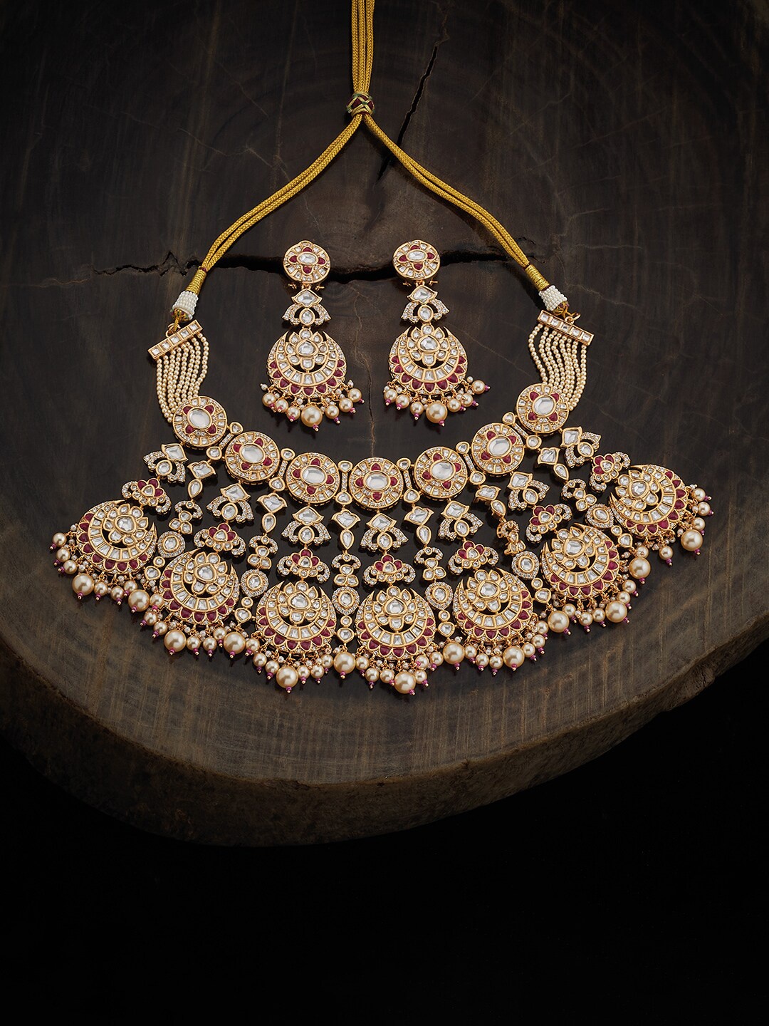 

Kushal's Fashion Jewellery Gold-plated Kundan Stone Studded Necklace & Earrings