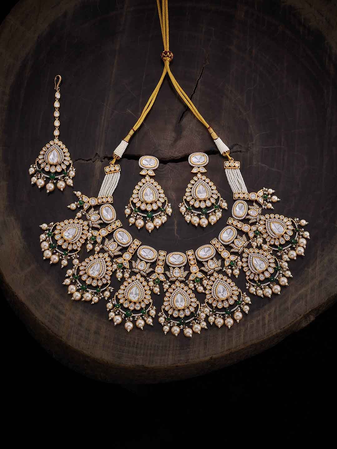 

Kushal's Fashion Jewellery Gold Plated Kundan Studded & Beaded Jewellery Set
