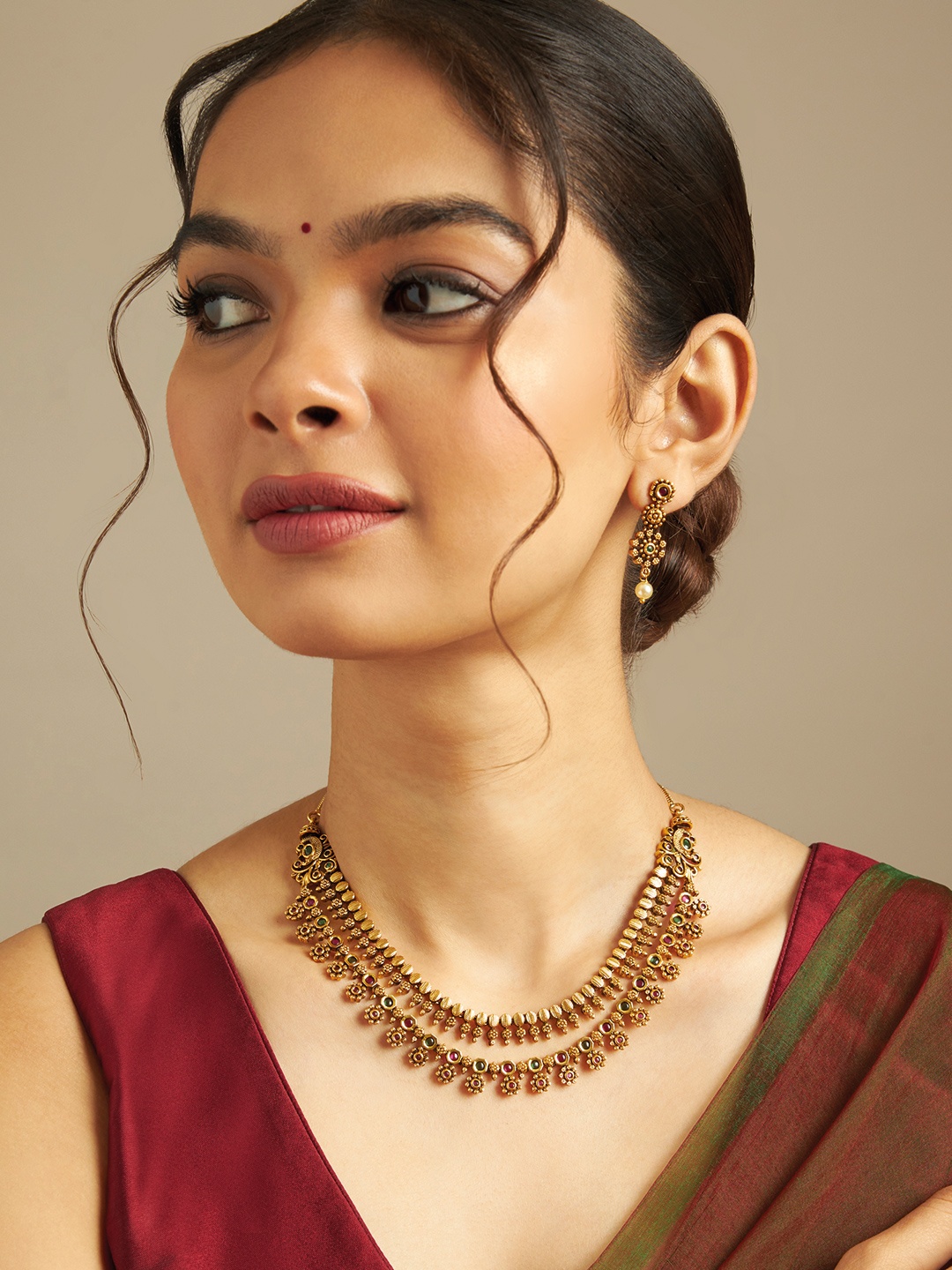 

Kushal's Fashion Jewellery Gold Plated Stones Studded Antique Jewellery Set