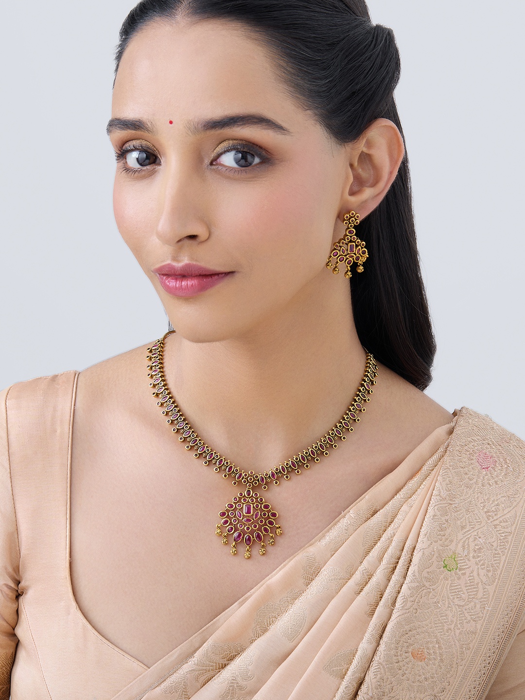 

Kushal's Fashion Jewellery Gold Plated Stones Studded Necklace & Earrings