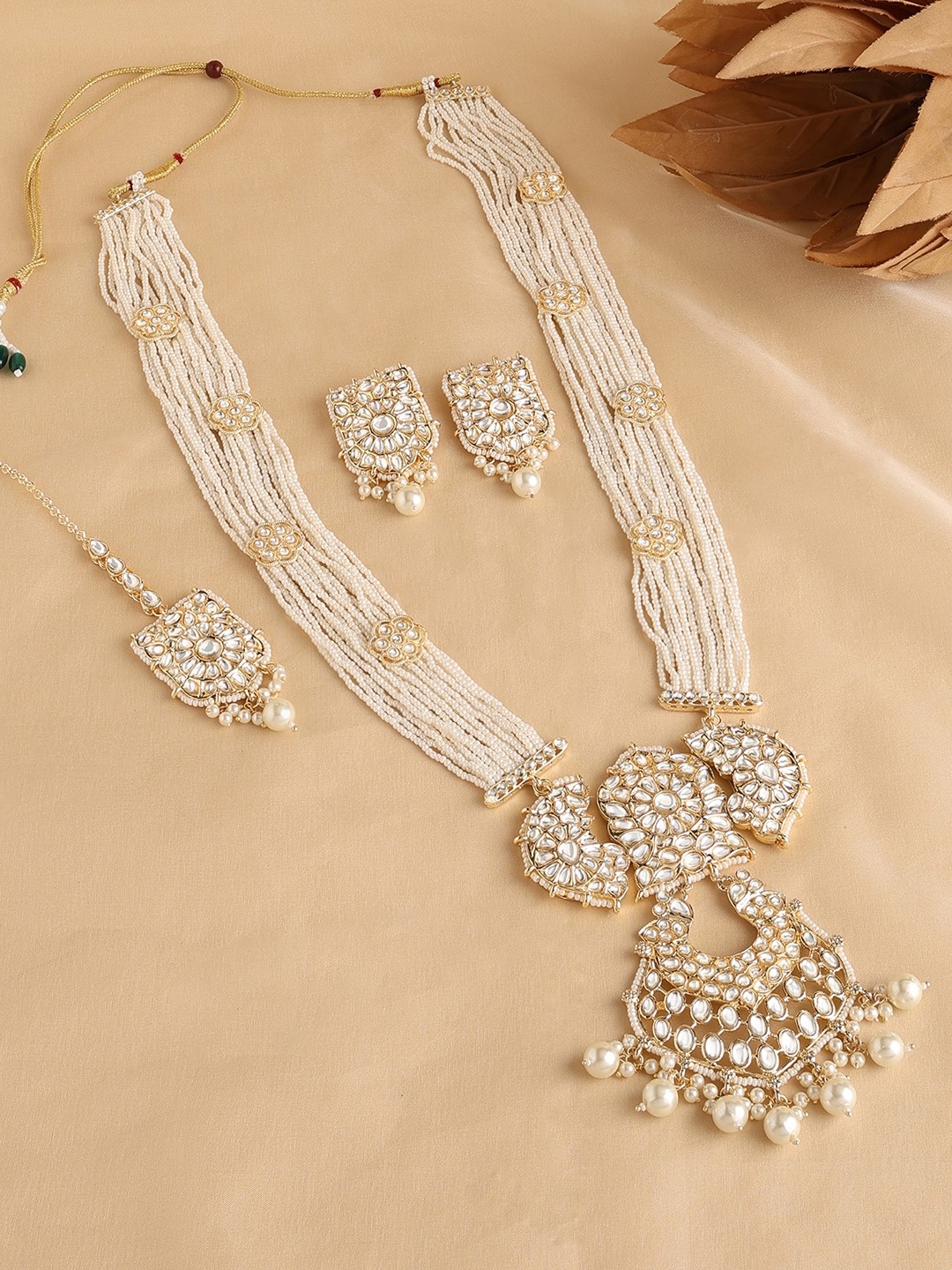 

Zaveri Pearls Gold-Plated Kundan Stone Studded & Bedded Jewellery Set