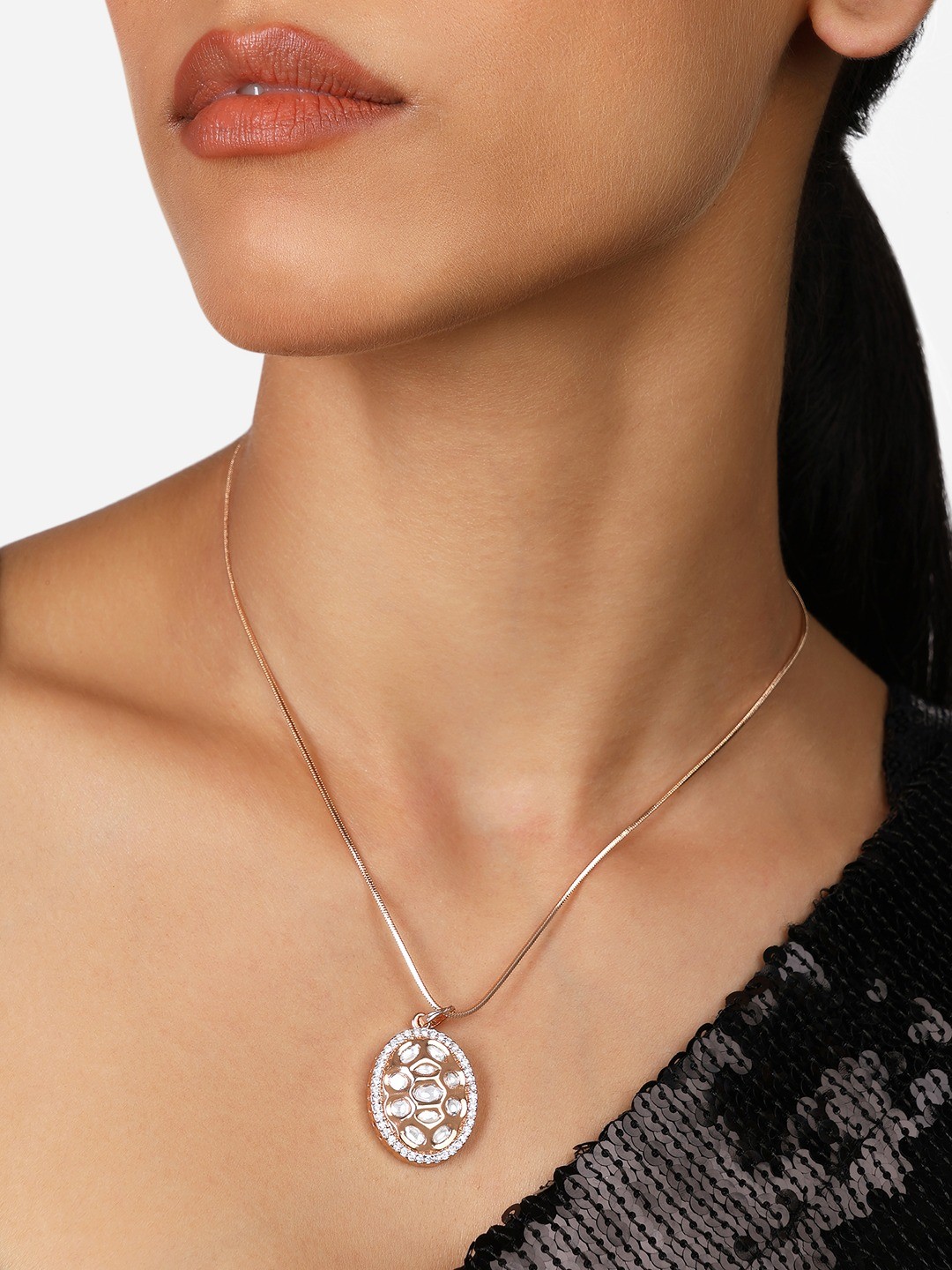 

Zaveri Pearls Rose Gold-Plated Oval Cubic Zirconia Studded Pendant with Chain