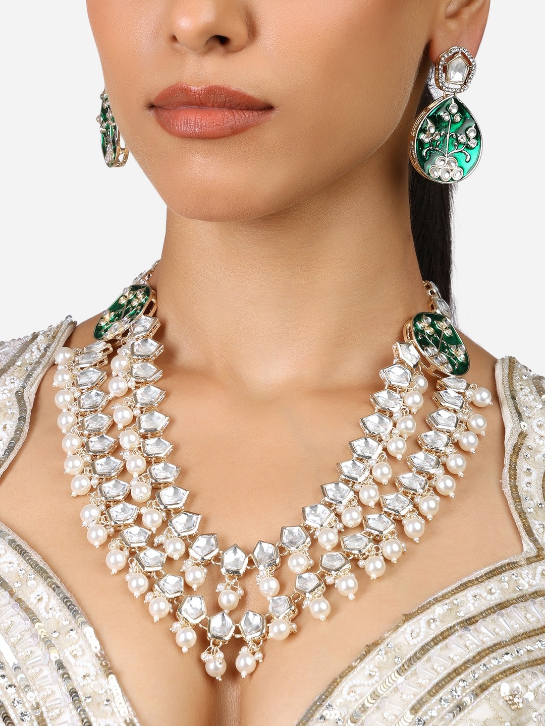 

Zaveri Pearls Gold Plated Kundan Studded & Pearls Beaded Jewellery Set