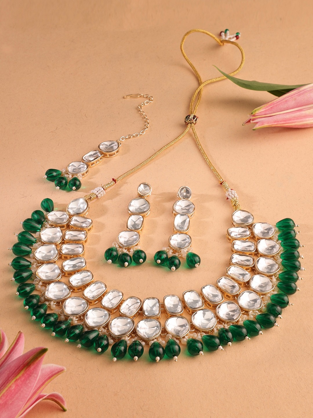 

Zaveri Pearls Gold Plated Stones Studded & Beaded Jewellery Set