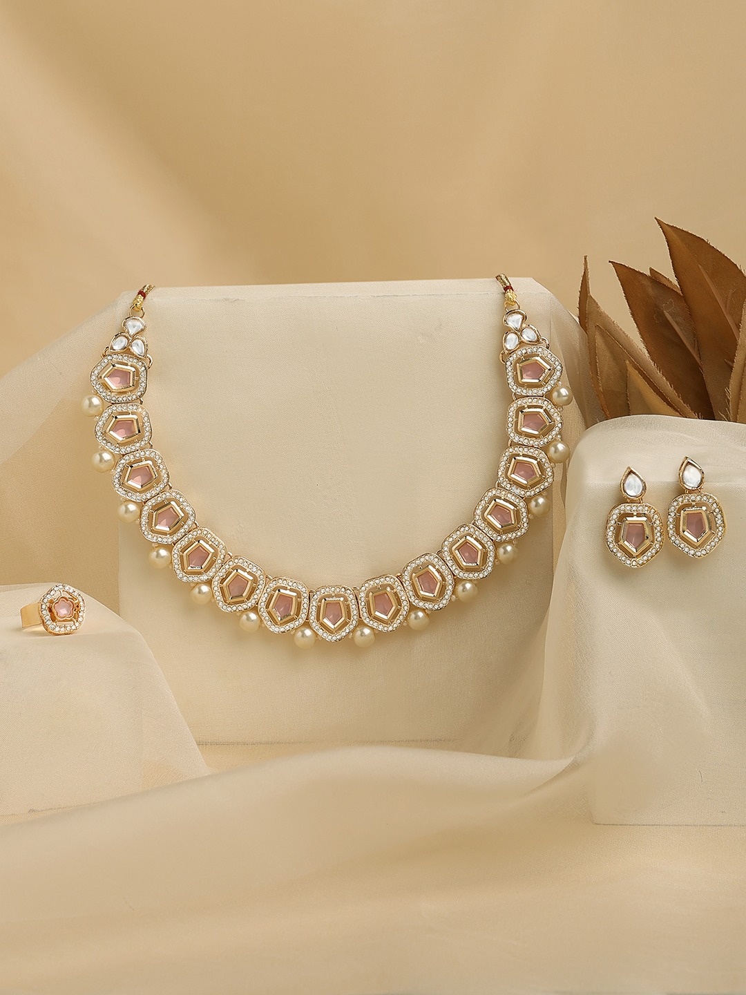 

Zaveri Pearls Gold Plated Stones Studded & Beaded Necklace And Earrings With Finger Ring