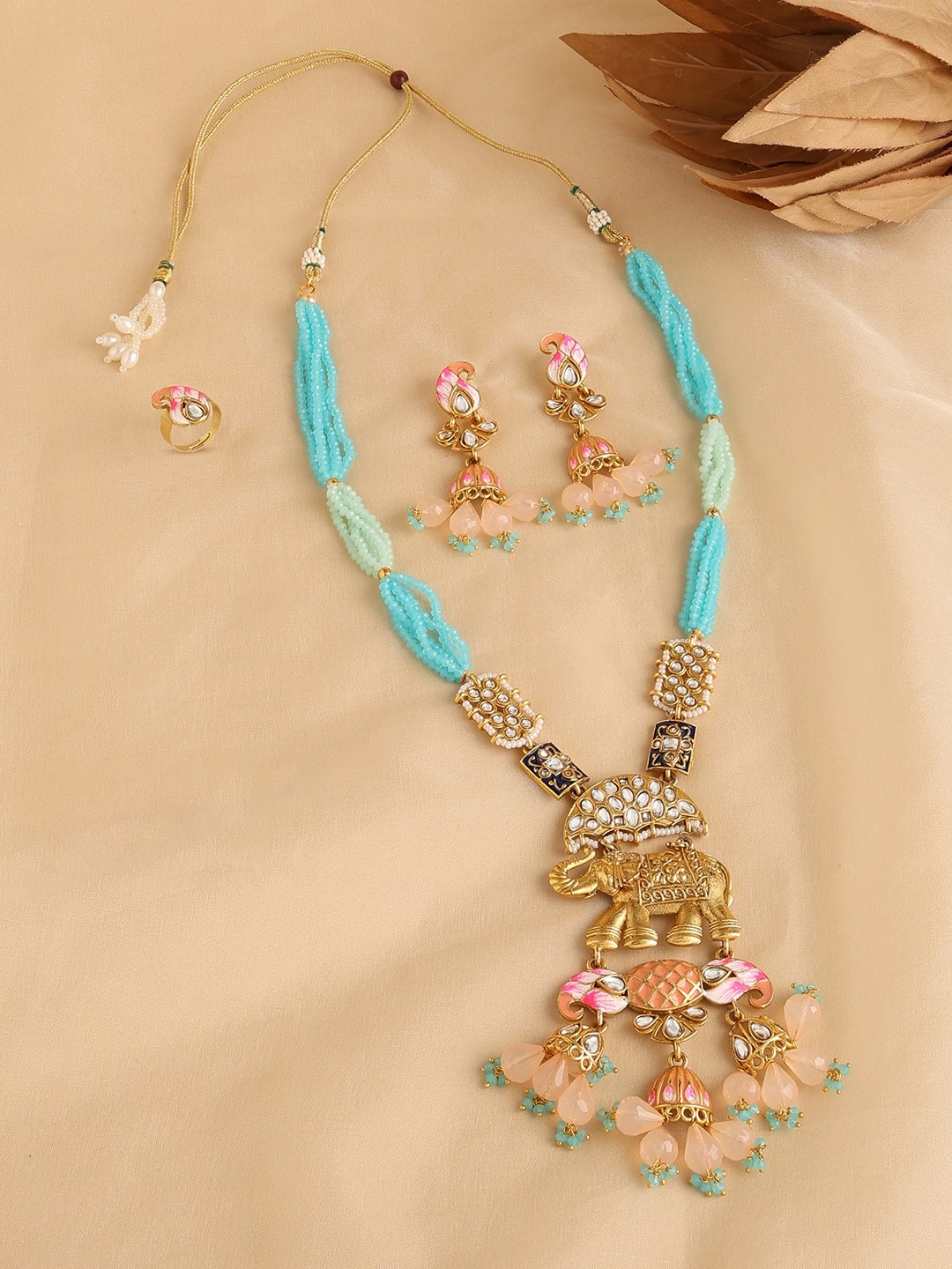 

Zaveri Pearls Gold-Plated Stones Studded & Beaded Jewellery Set