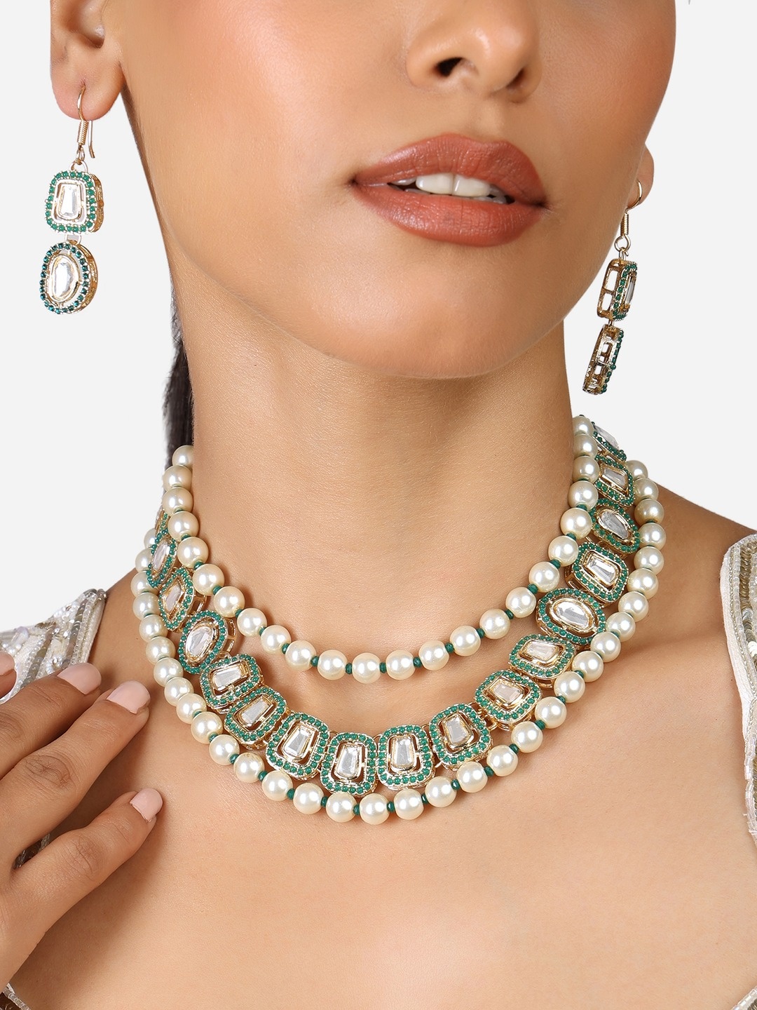 

Zaveri Pearls Gold Plated Stones Studded & Beaded Necklace And Earrings