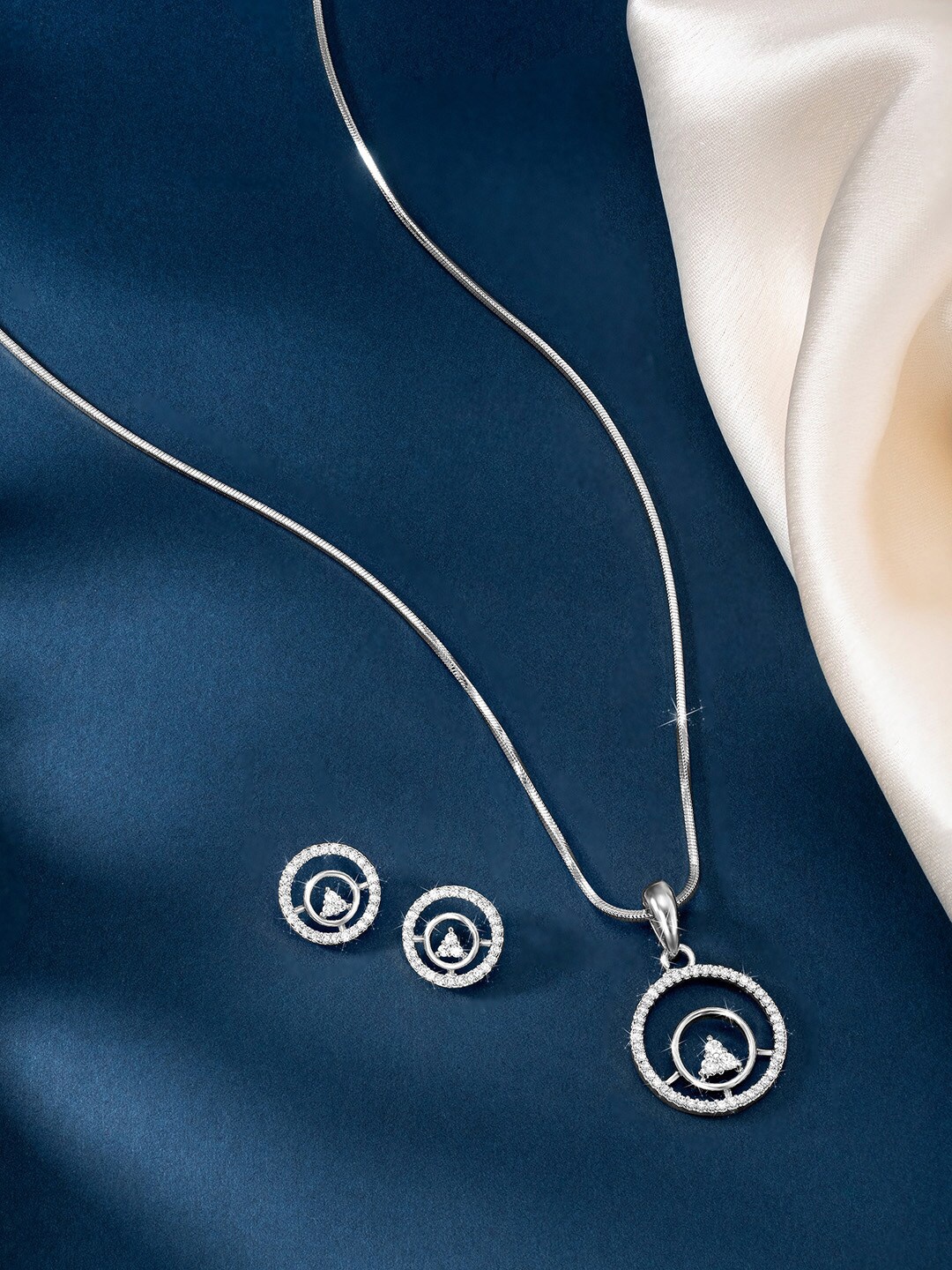 

Peora Silver Plated CZ Studded Pendent With Chain & Earrings