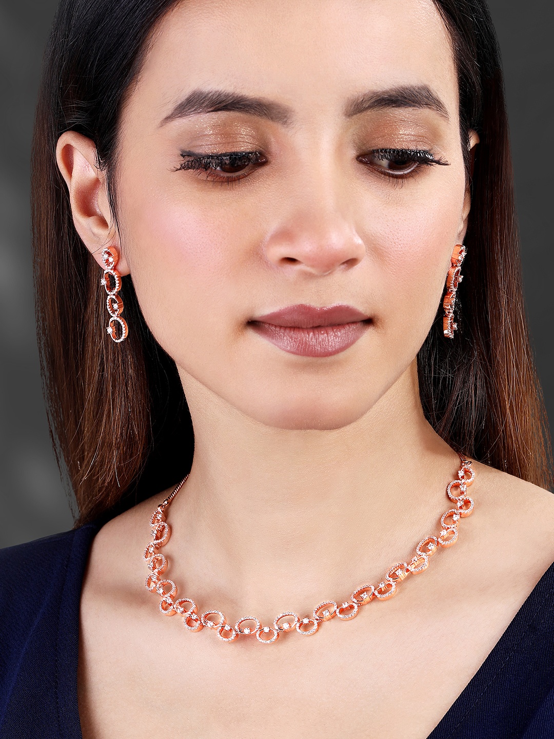 

Peora Rose Gold Plated Cubic Zirconia Studded Necklace & Earrings