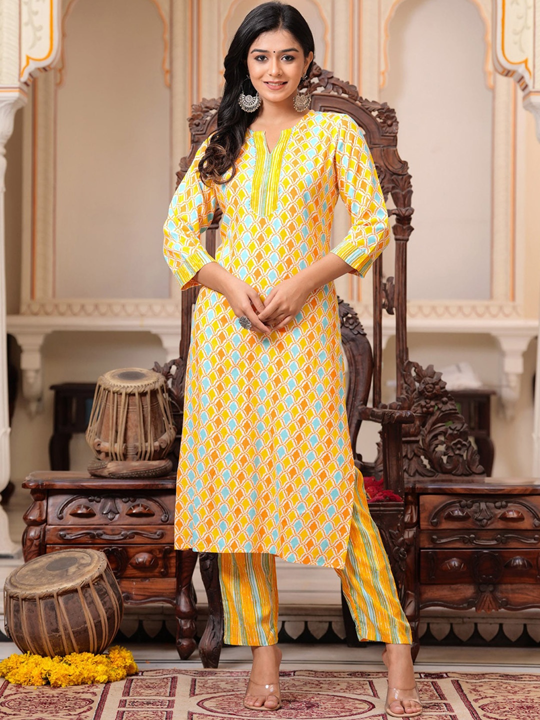 

BAESD Women Printed Regular Kurta with Trousers, Yellow