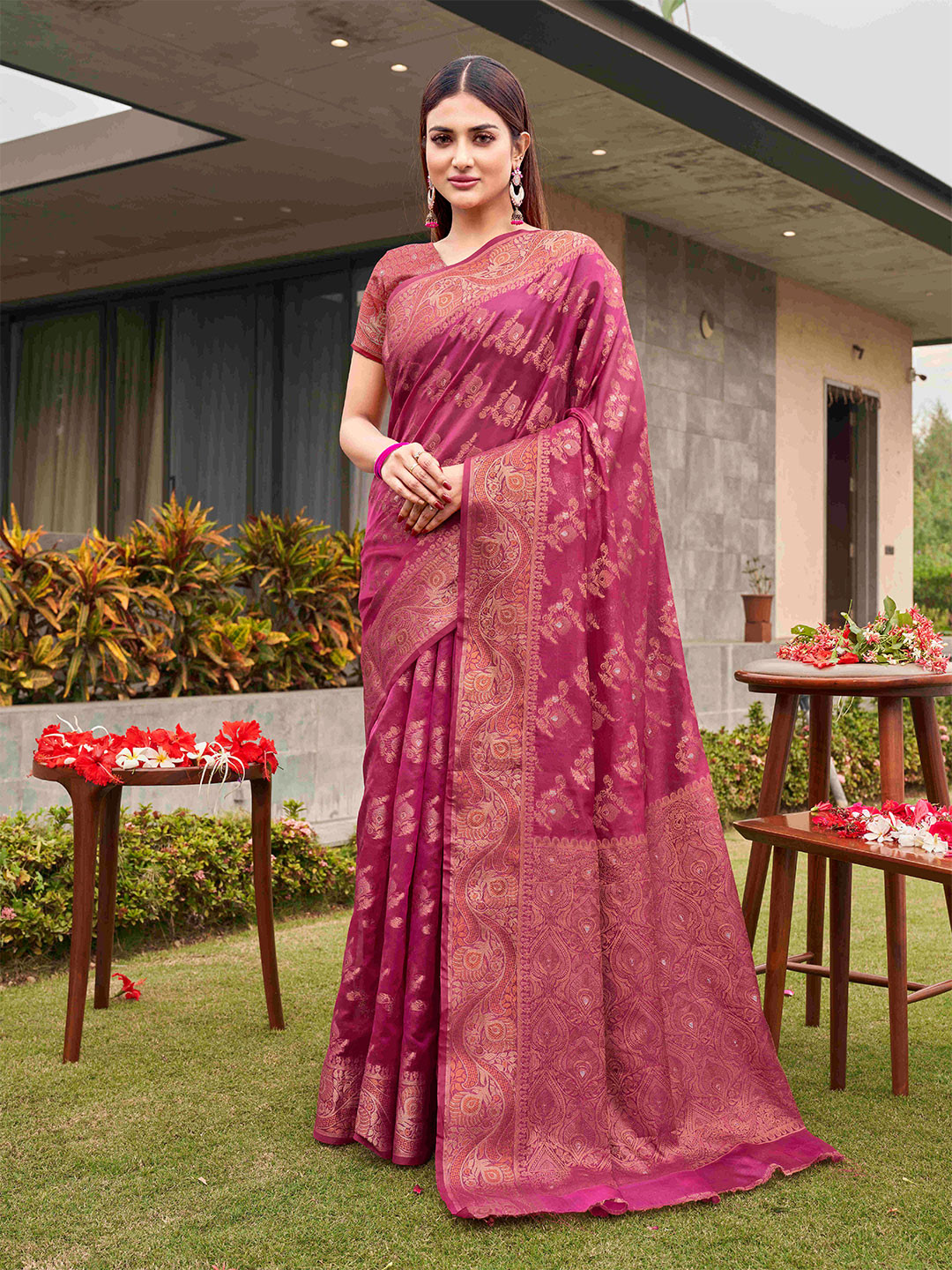 

Tikhi Imli Pink Ethnic Motifs Woven Design Zari Saree